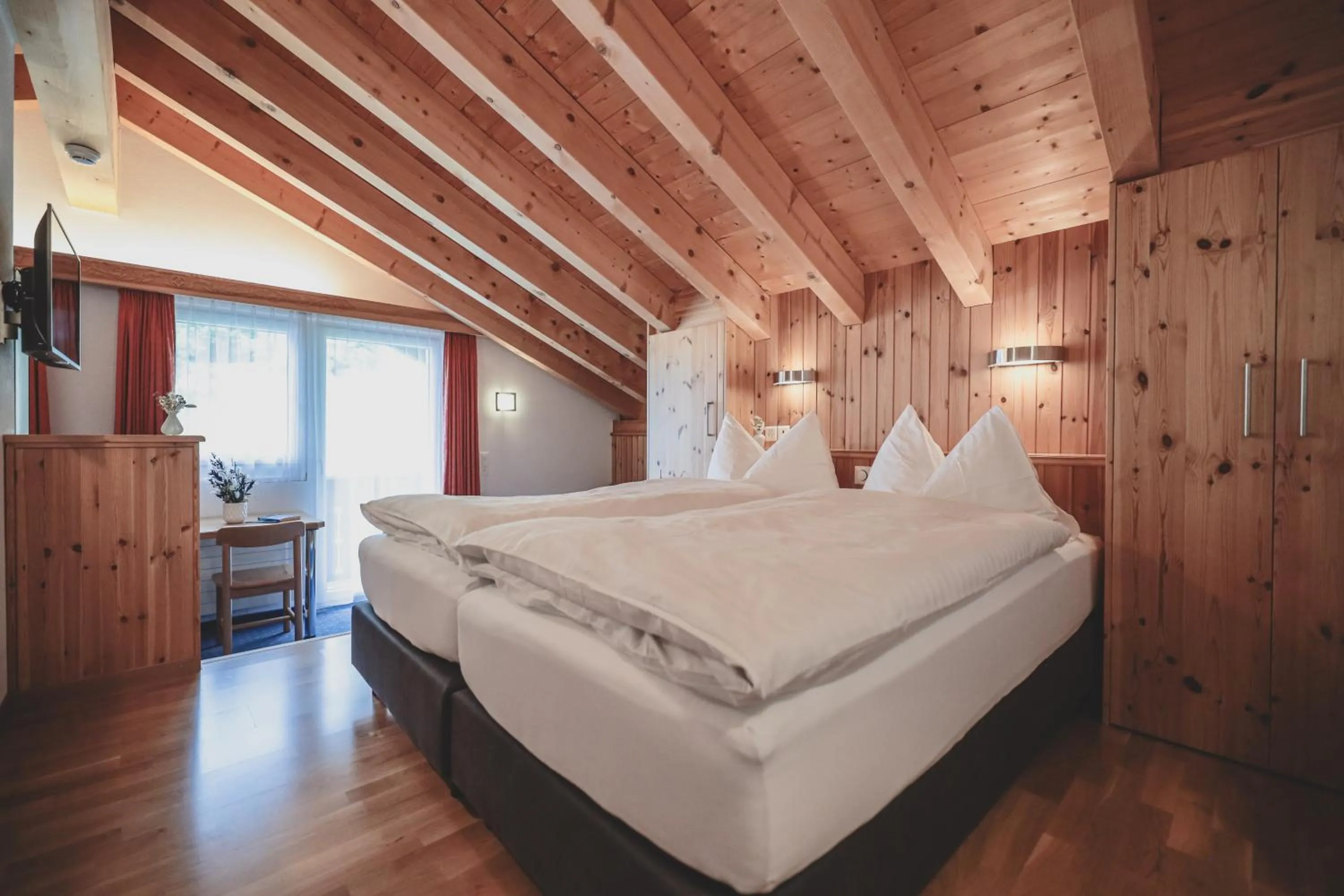 Bed in Hotel Sonnenhalde, Arosa