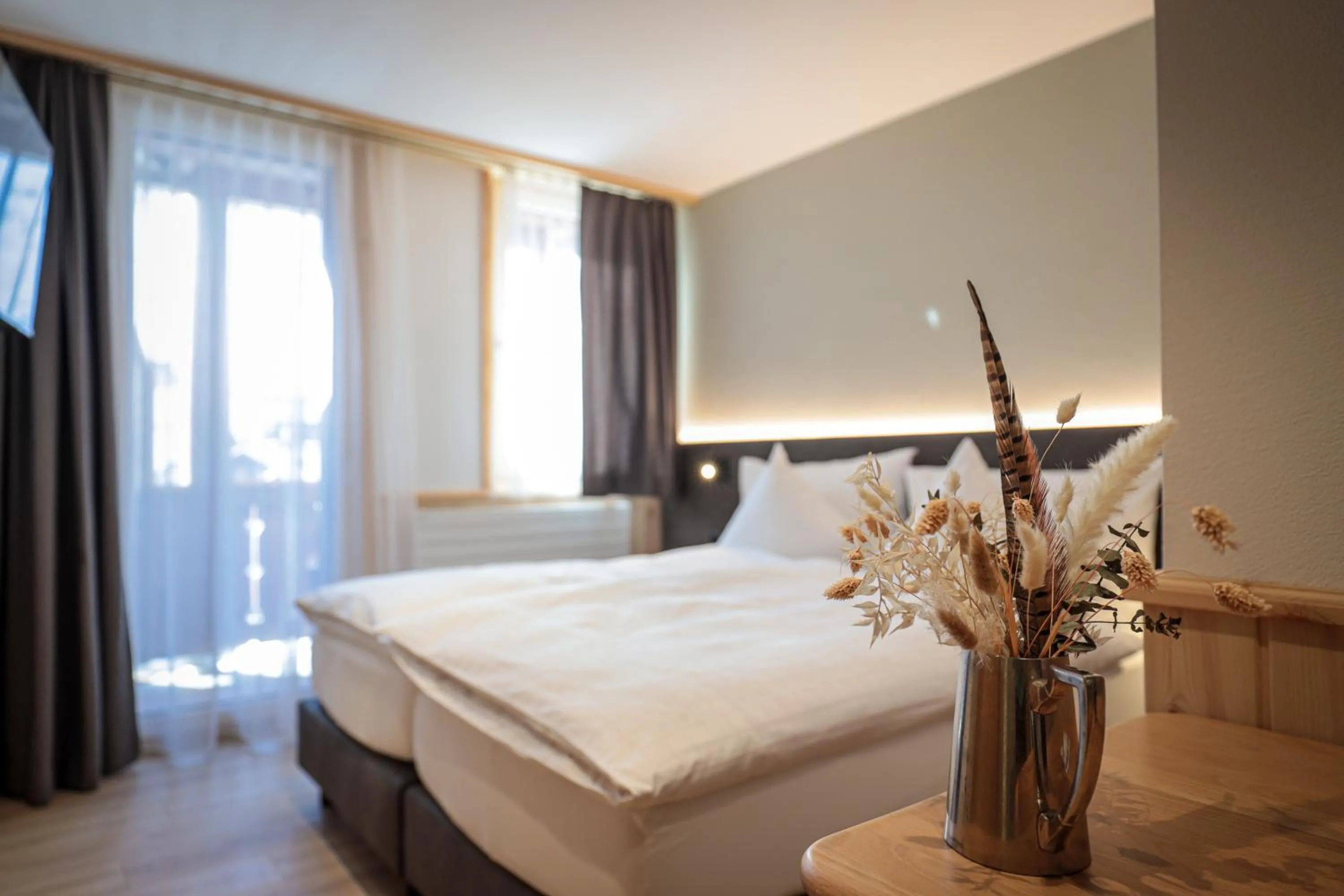 Photo of the whole room, Bed in Hotel Sonnenhalde, Arosa