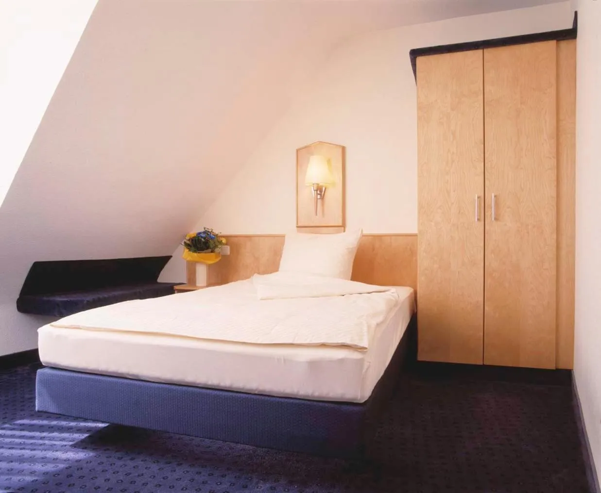 Bed in Hotel Sauer Garni