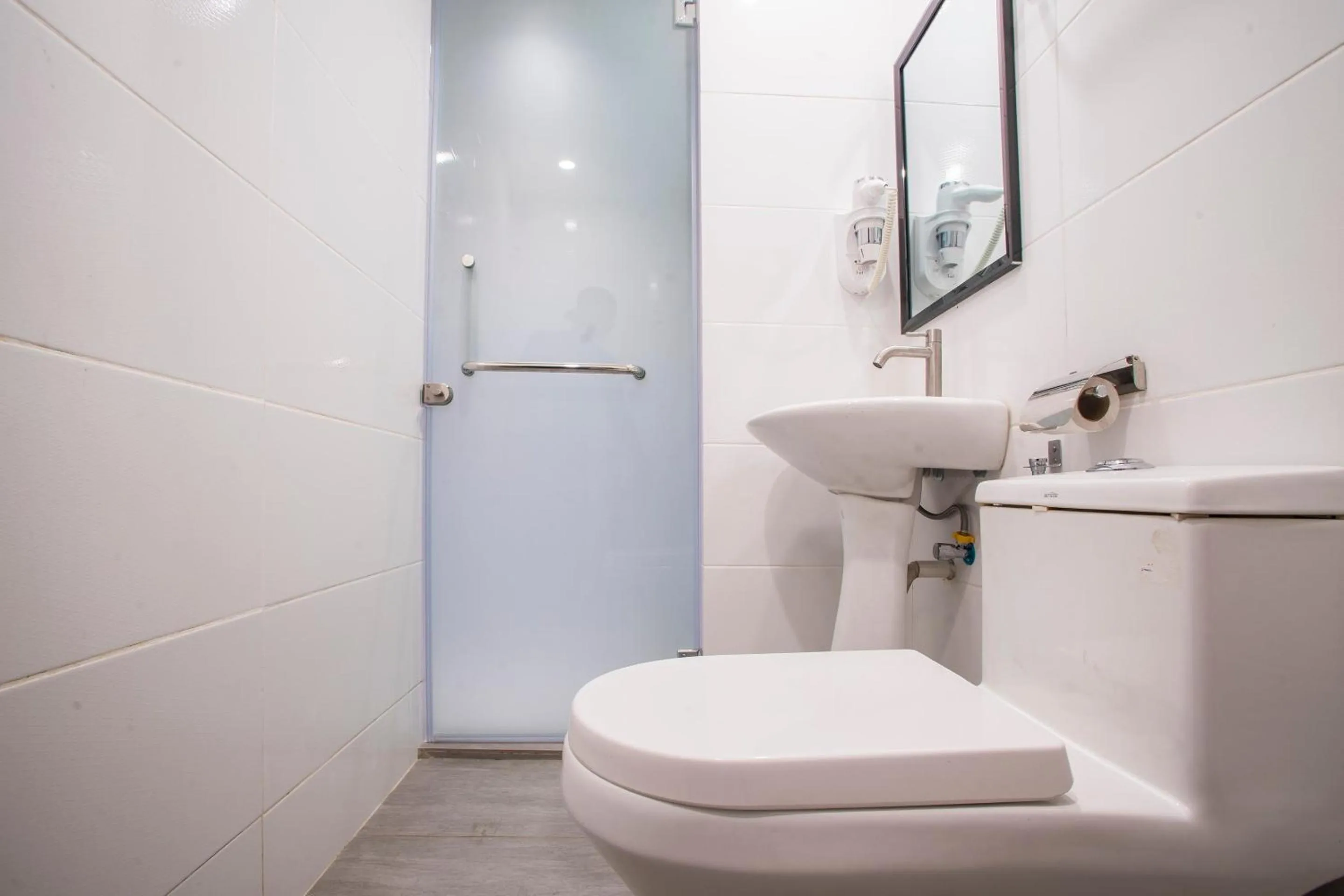 Bathroom in Hotel O Gs Hotels Near Strand Mall