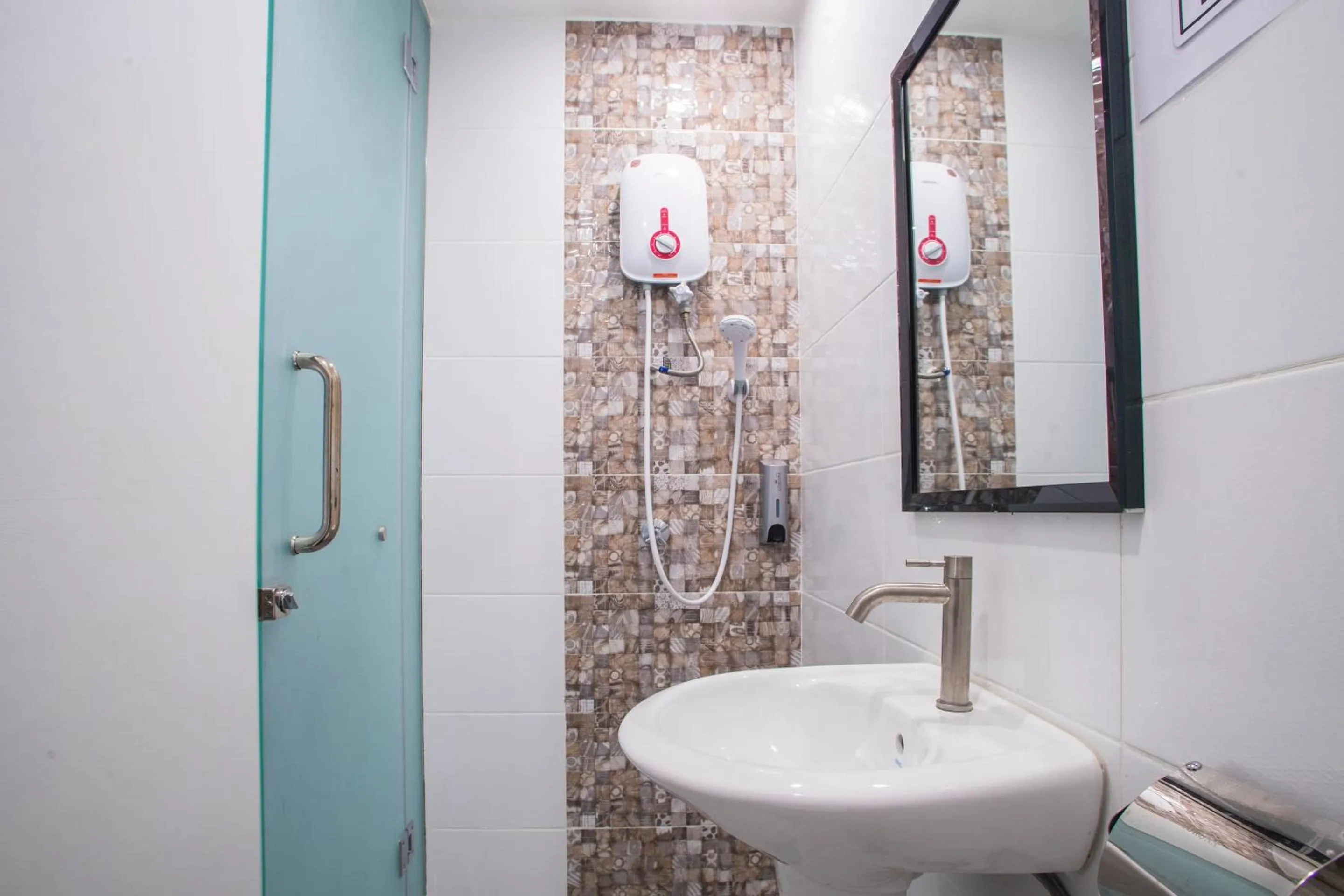 Bedroom in Hotel O Gs Hotels Near Strand Mall