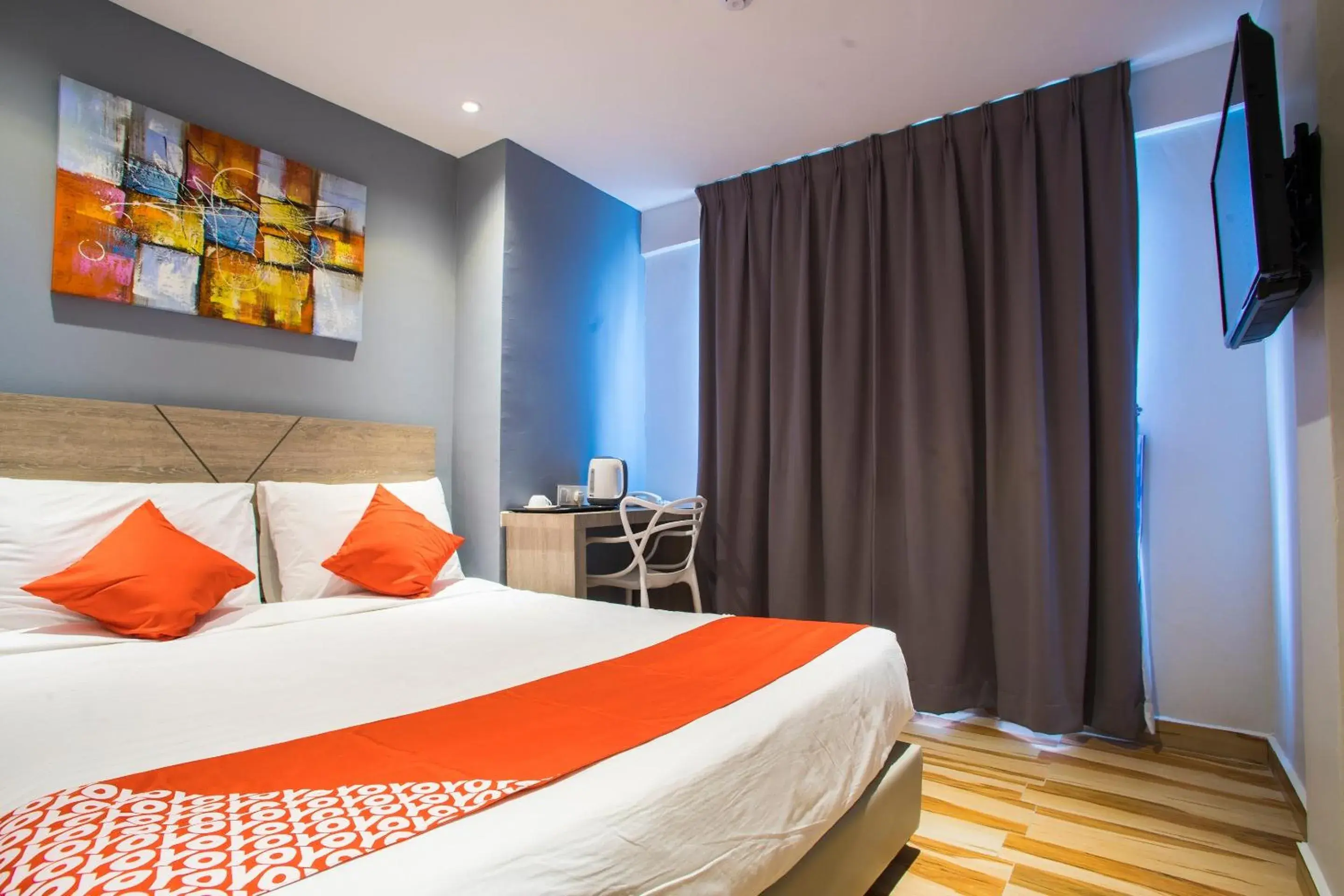 Deluxe Queen Room in Hotel O Gs Hotels Near Strand Mall Deluxe Queen Room in Hotel O Gs Hotels Near Strand Mall