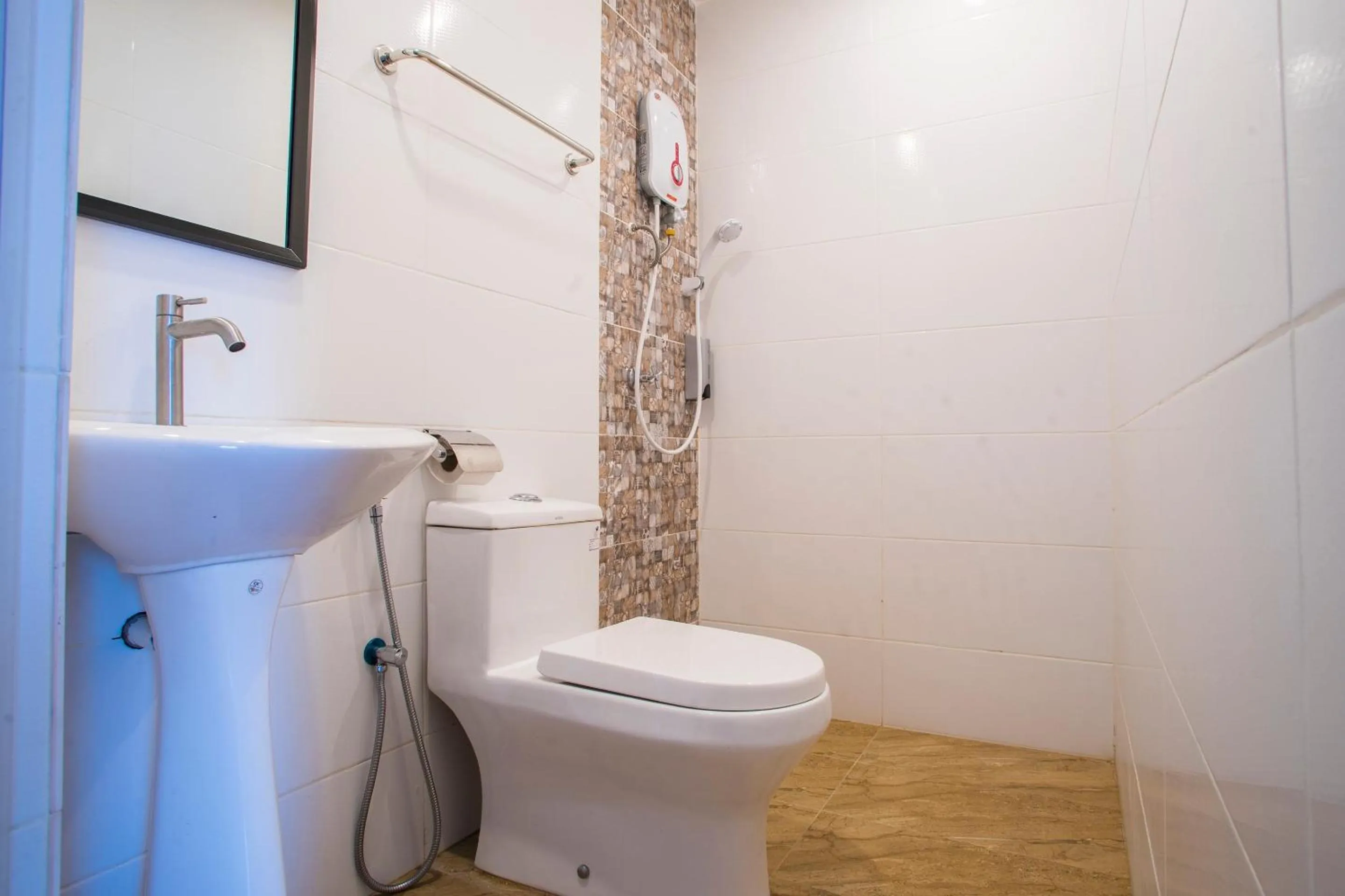 Bathroom in Hotel O Gs Hotels Near Strand Mall