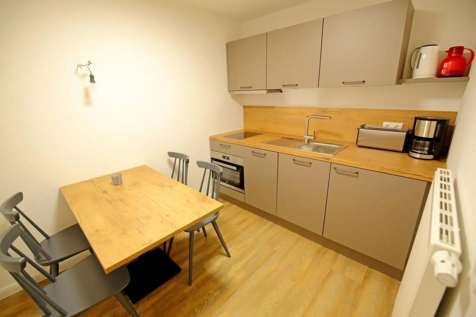 Kitchen or kitchenette in Aparthotel Deutscher Kaiser Ferienwohnungen