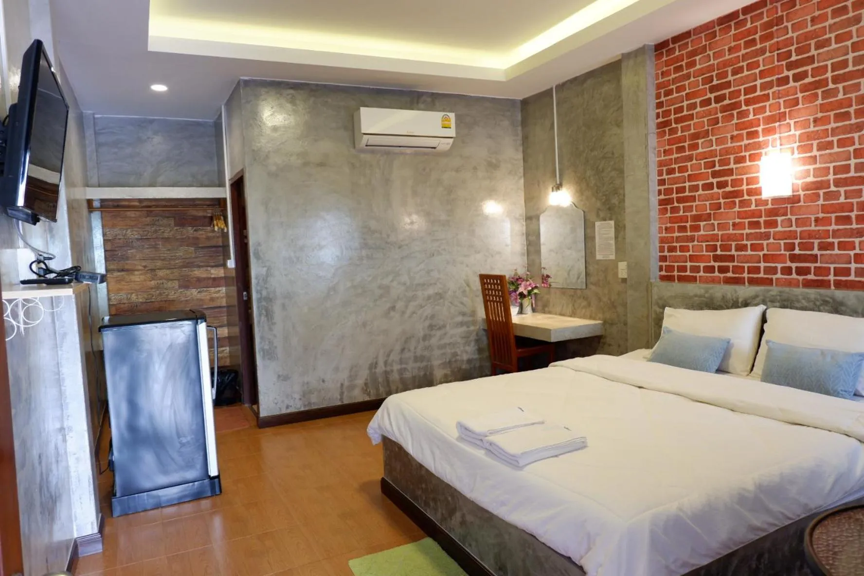 Bed in โรงแรมโทนี่วิลเลจTony Hotel