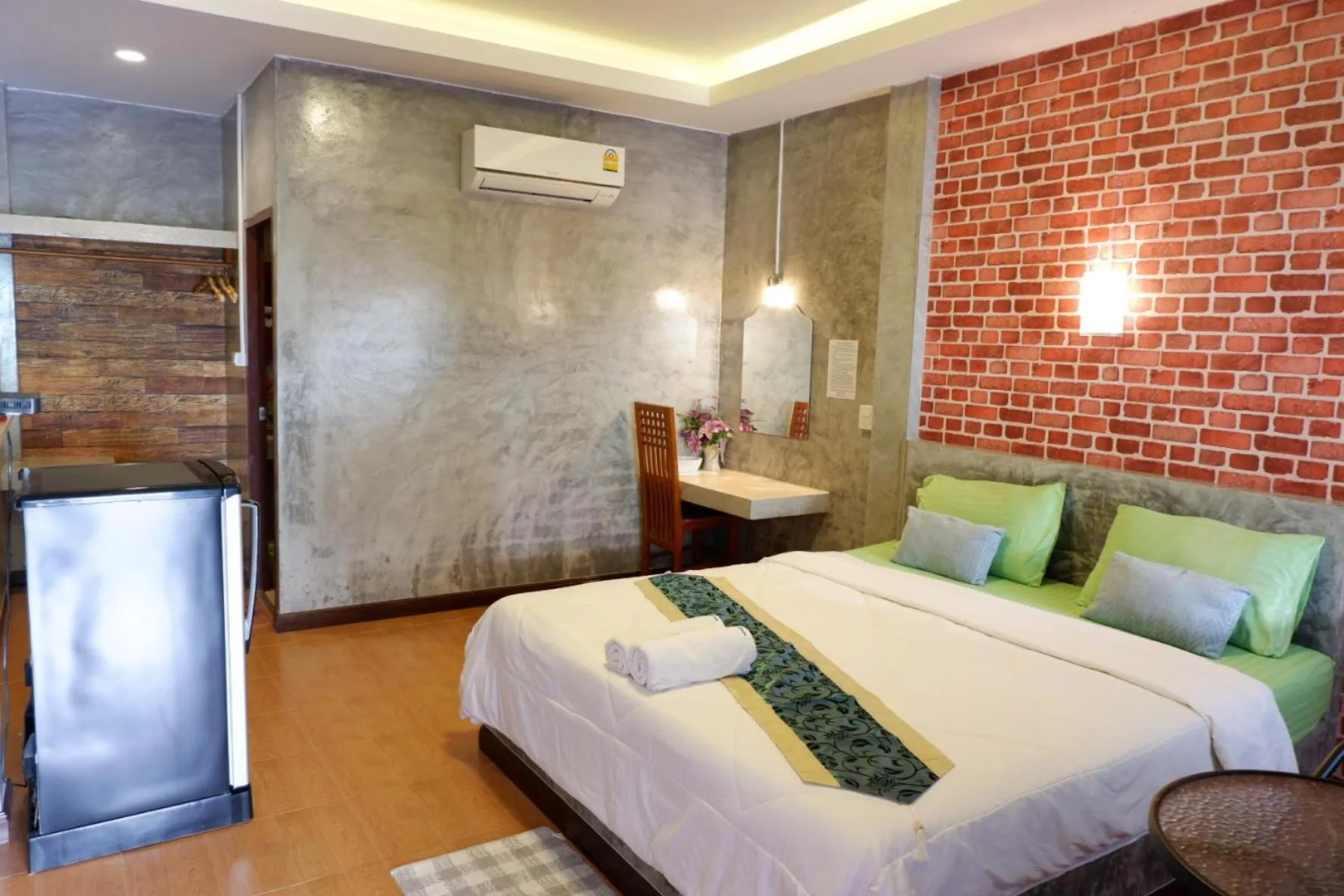 Bed in โรงแรมโทนี่วิลเลจTony Hotel