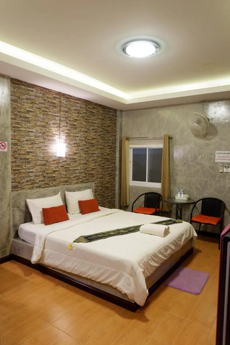 Bed in โรงแรมโทนี่วิลเลจTony Hotel