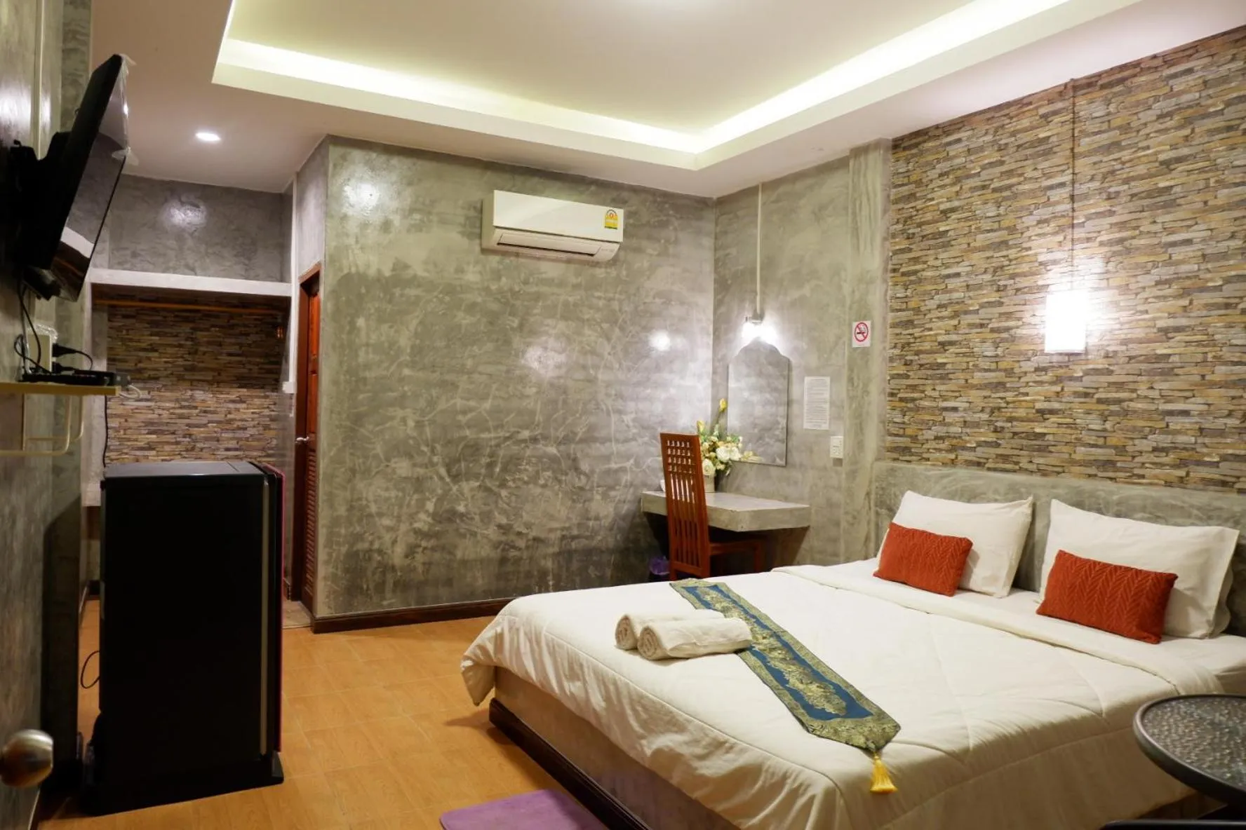 Bed in โรงแรมโทนี่วิลเลจTony Hotel