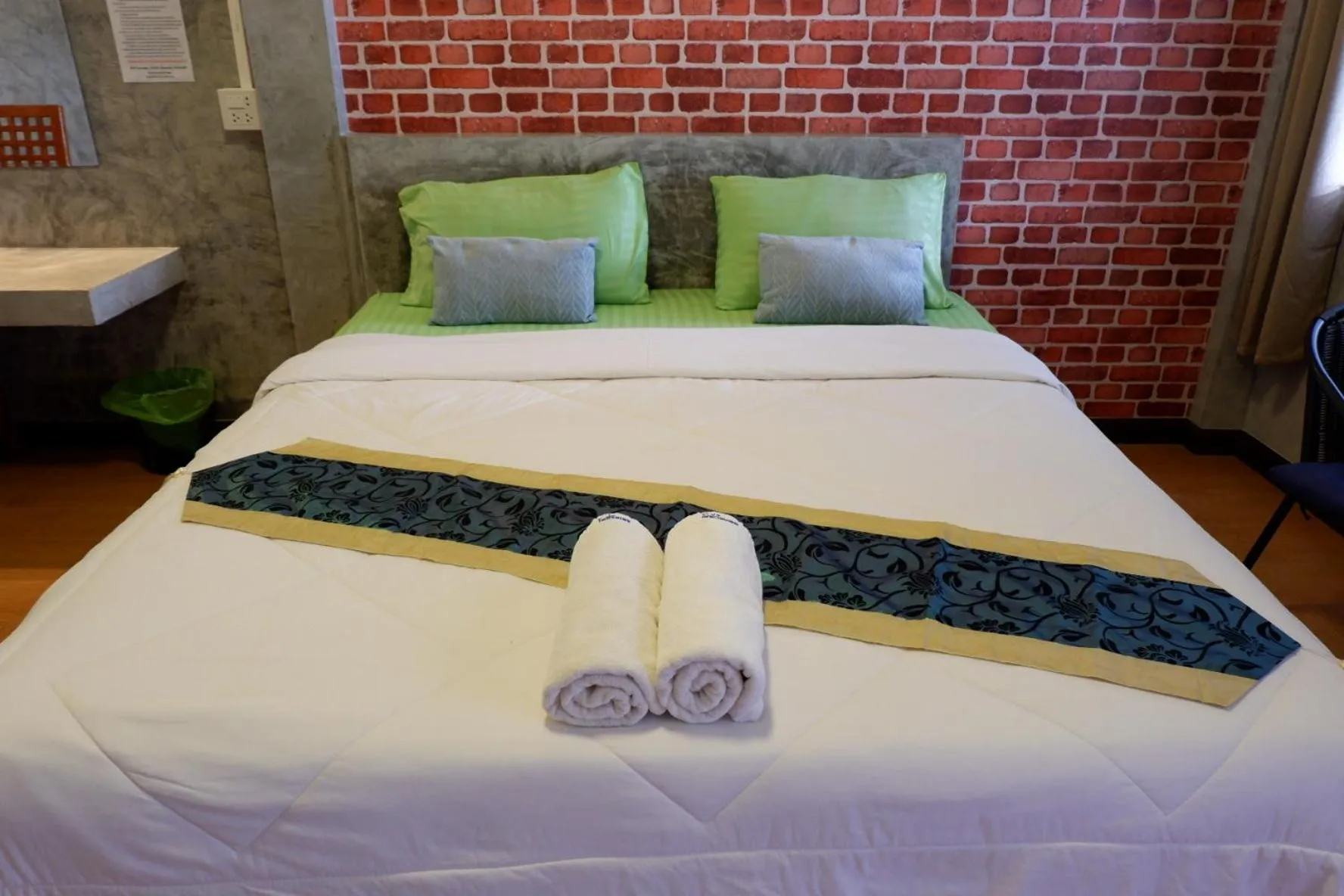 Bed in โรงแรมโทนี่วิลเลจTony Hotel