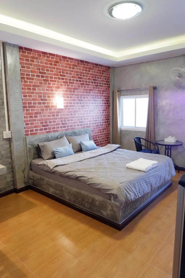 Bed in โรงแรมโทนี่วิลเลจTony Hotel