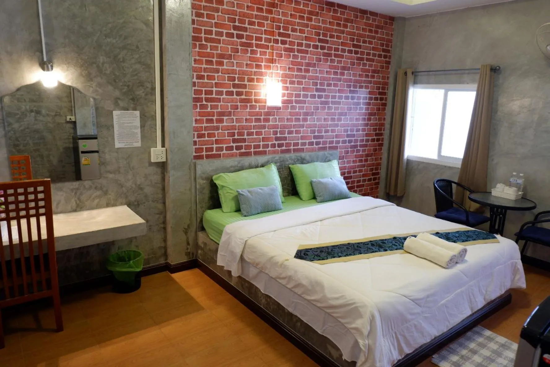 Bed in โรงแรมโทนี่วิลเลจTony Hotel