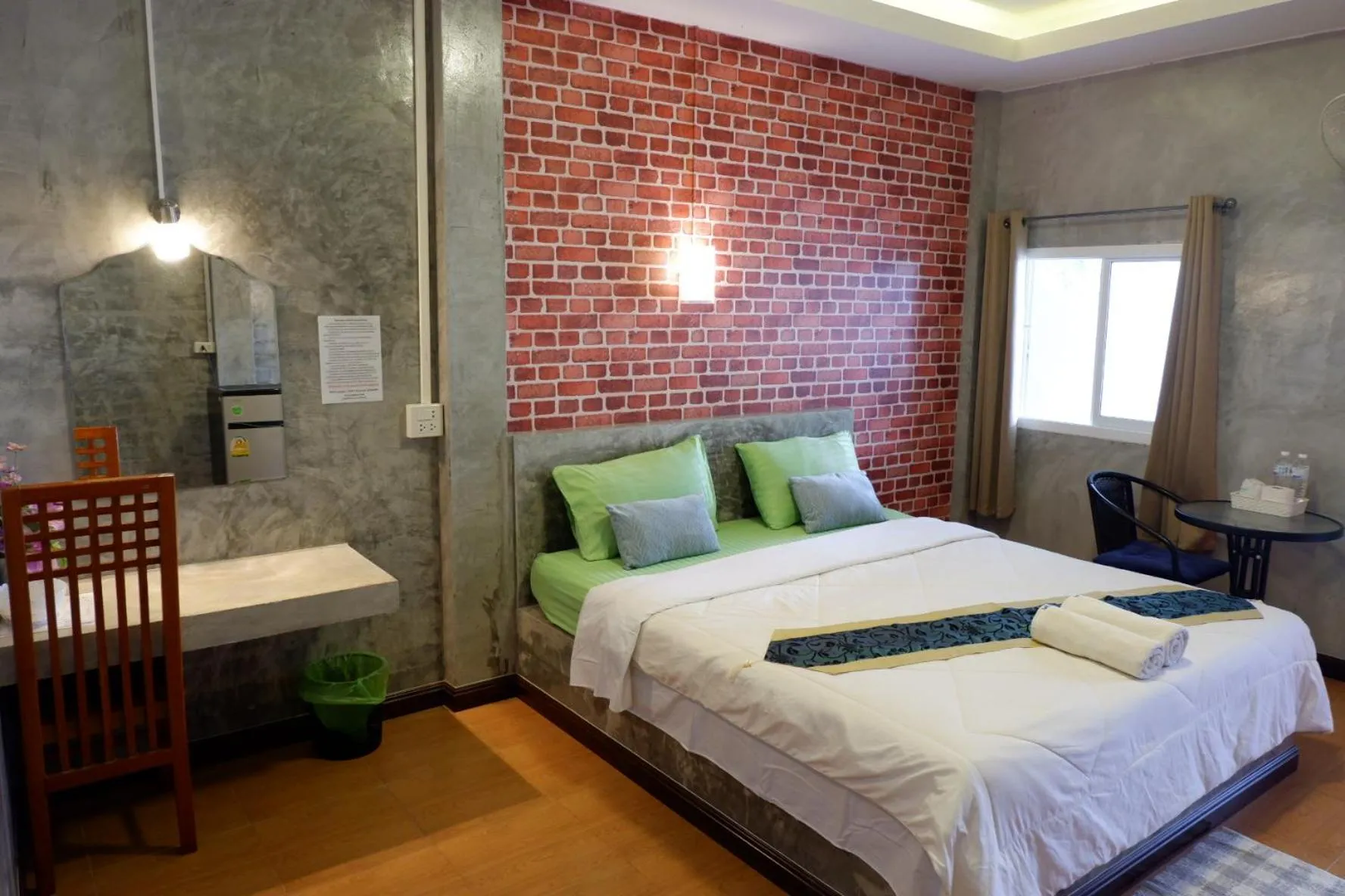 Bed in โรงแรมโทนี่วิลเลจTony Hotel