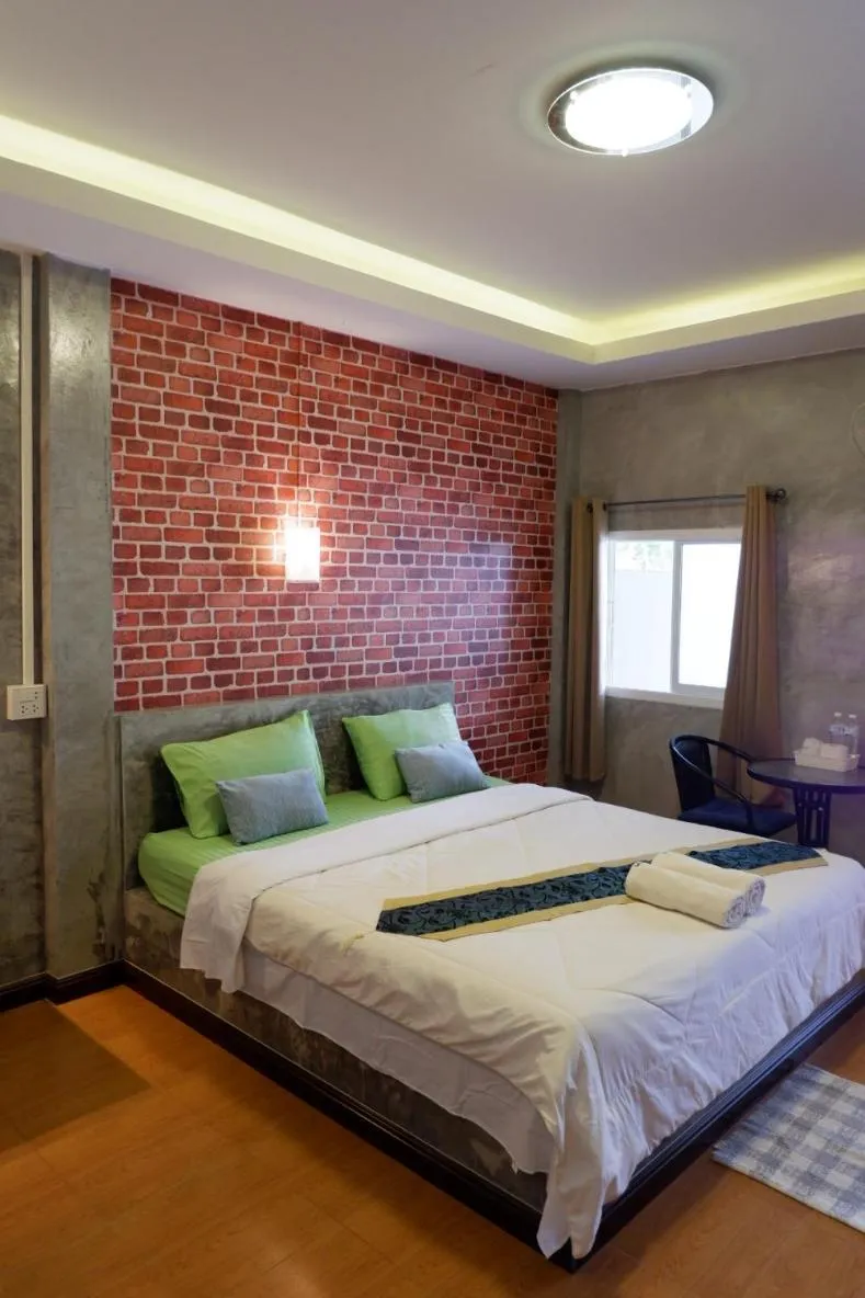 Bed in โรงแรมโทนี่วิลเลจTony Hotel