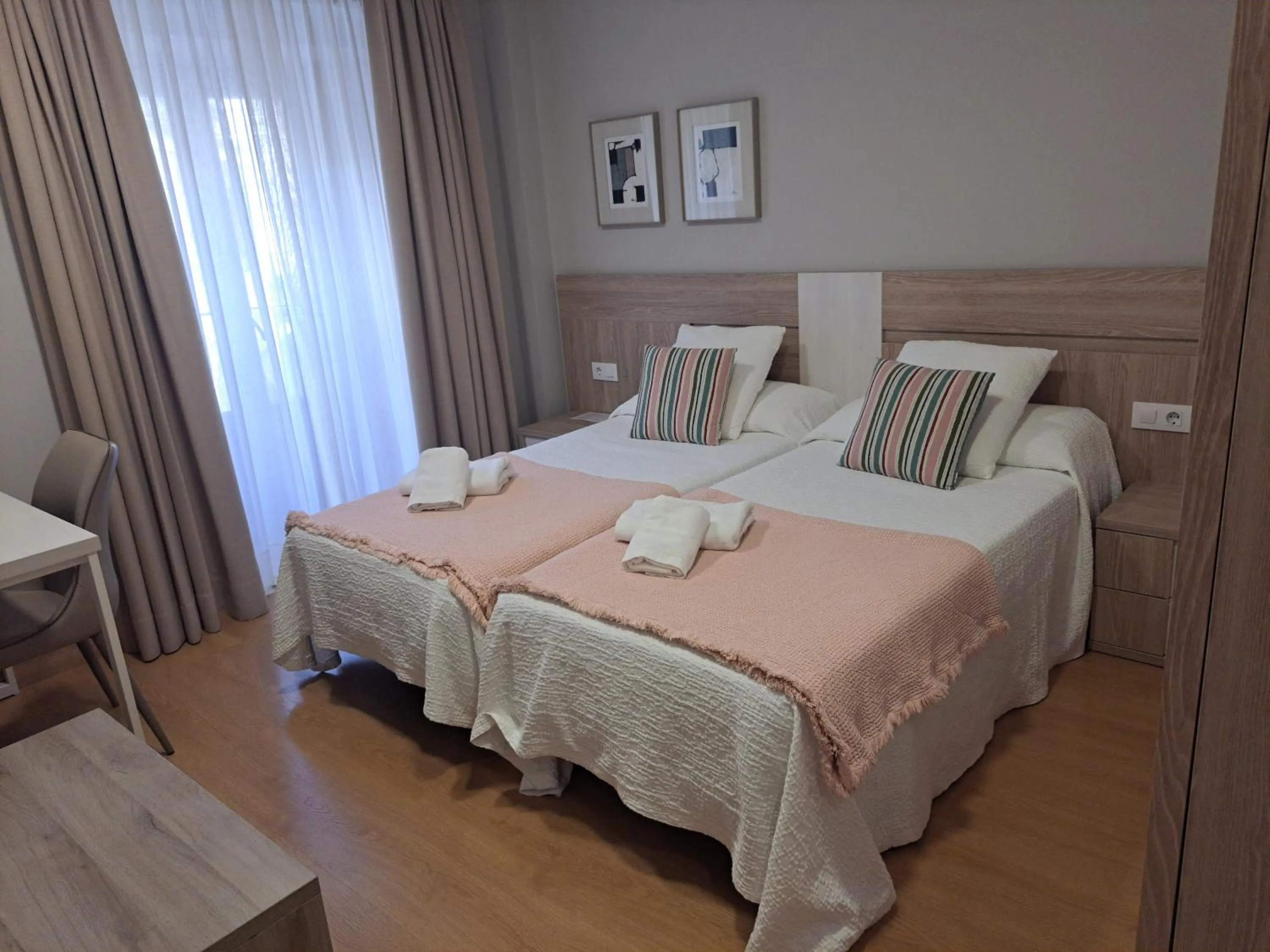 Bed in Hotel Roquiño