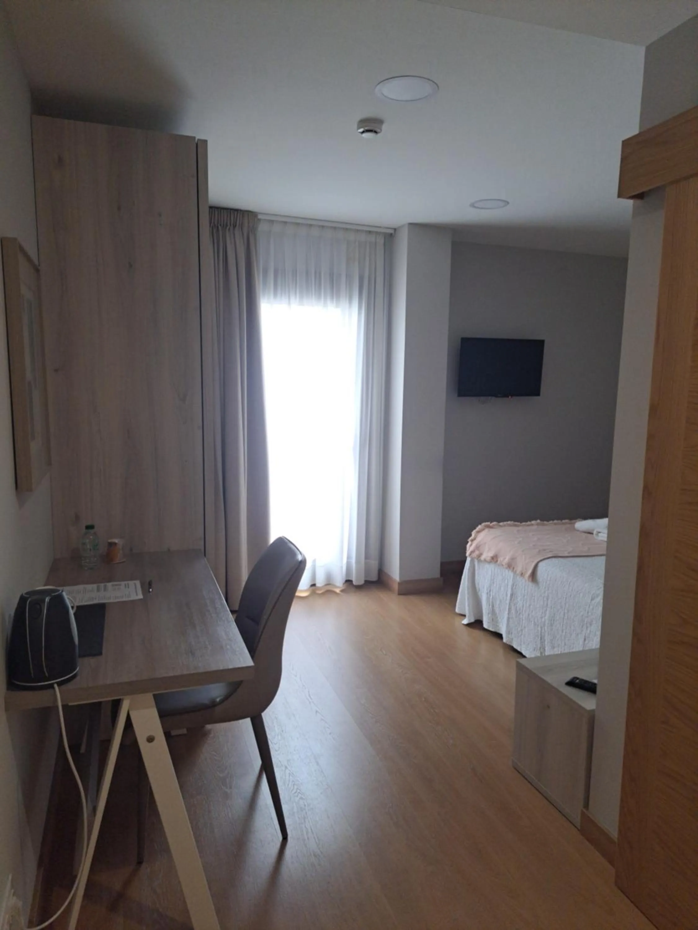 Photo of the whole room, Bed in Hotel Roquiño