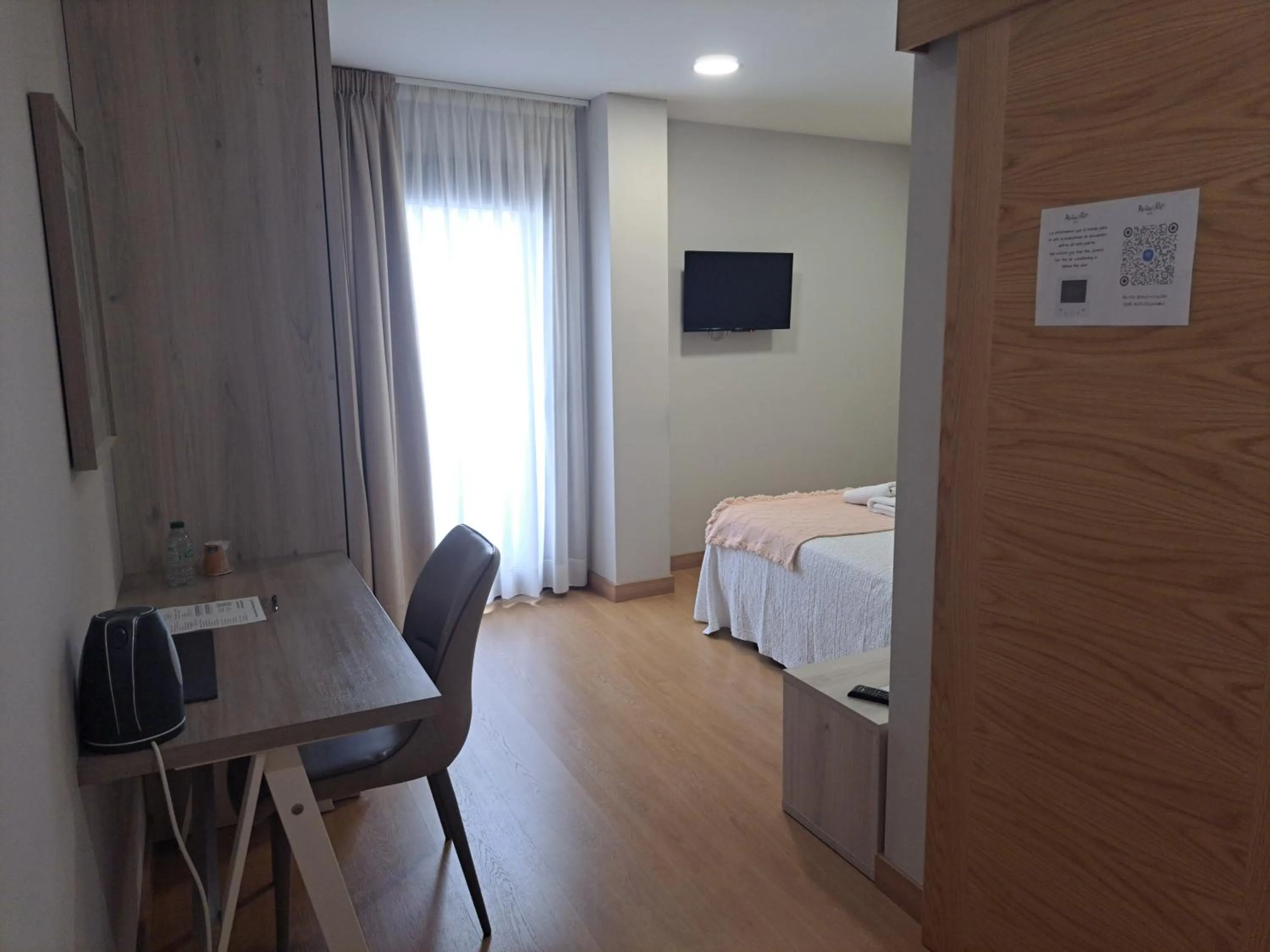 Photo of the whole room, Bed in Hotel Roquiño