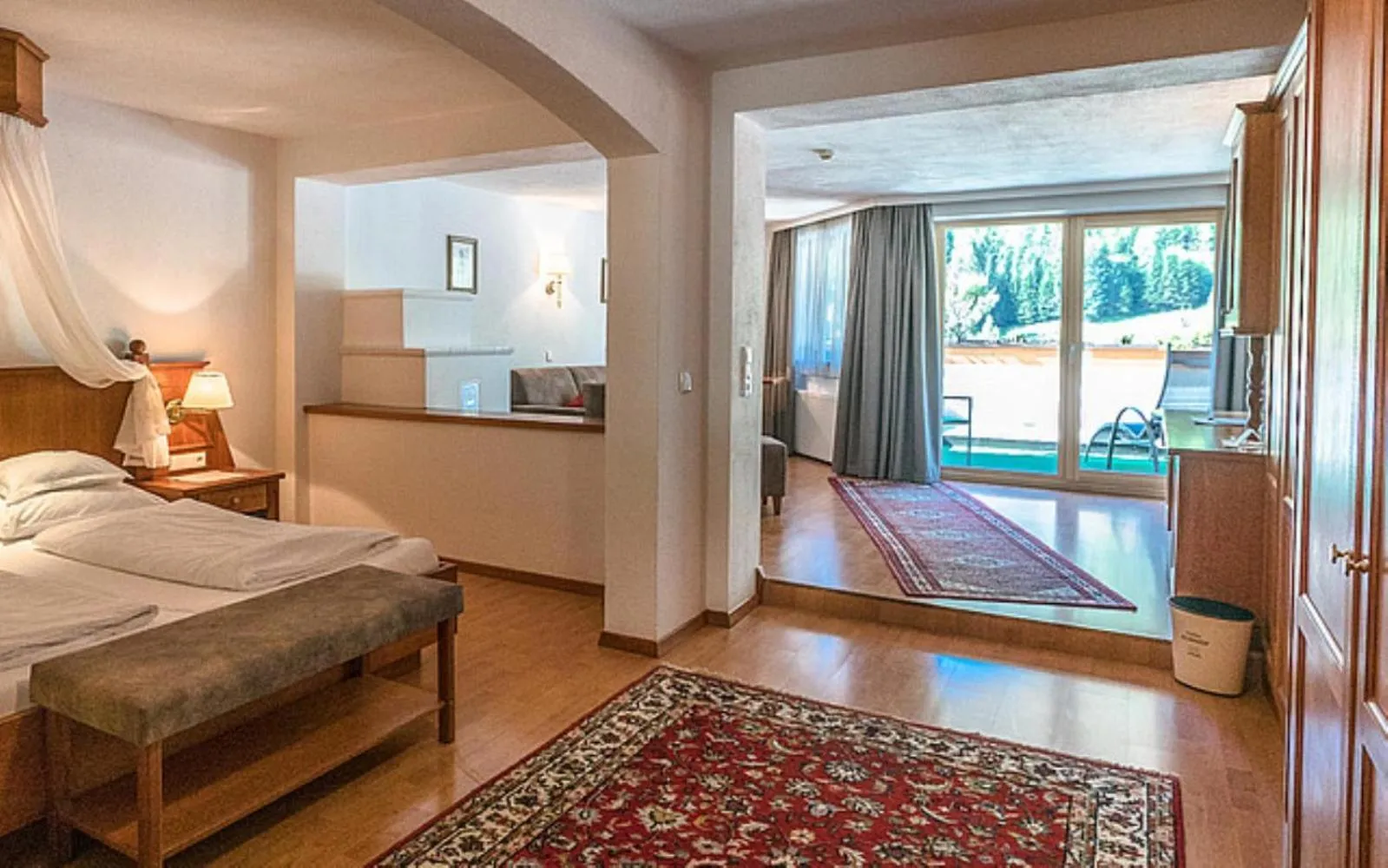 Photo of the whole room, Bed in Wellnesshotel Mein Almhof Superior