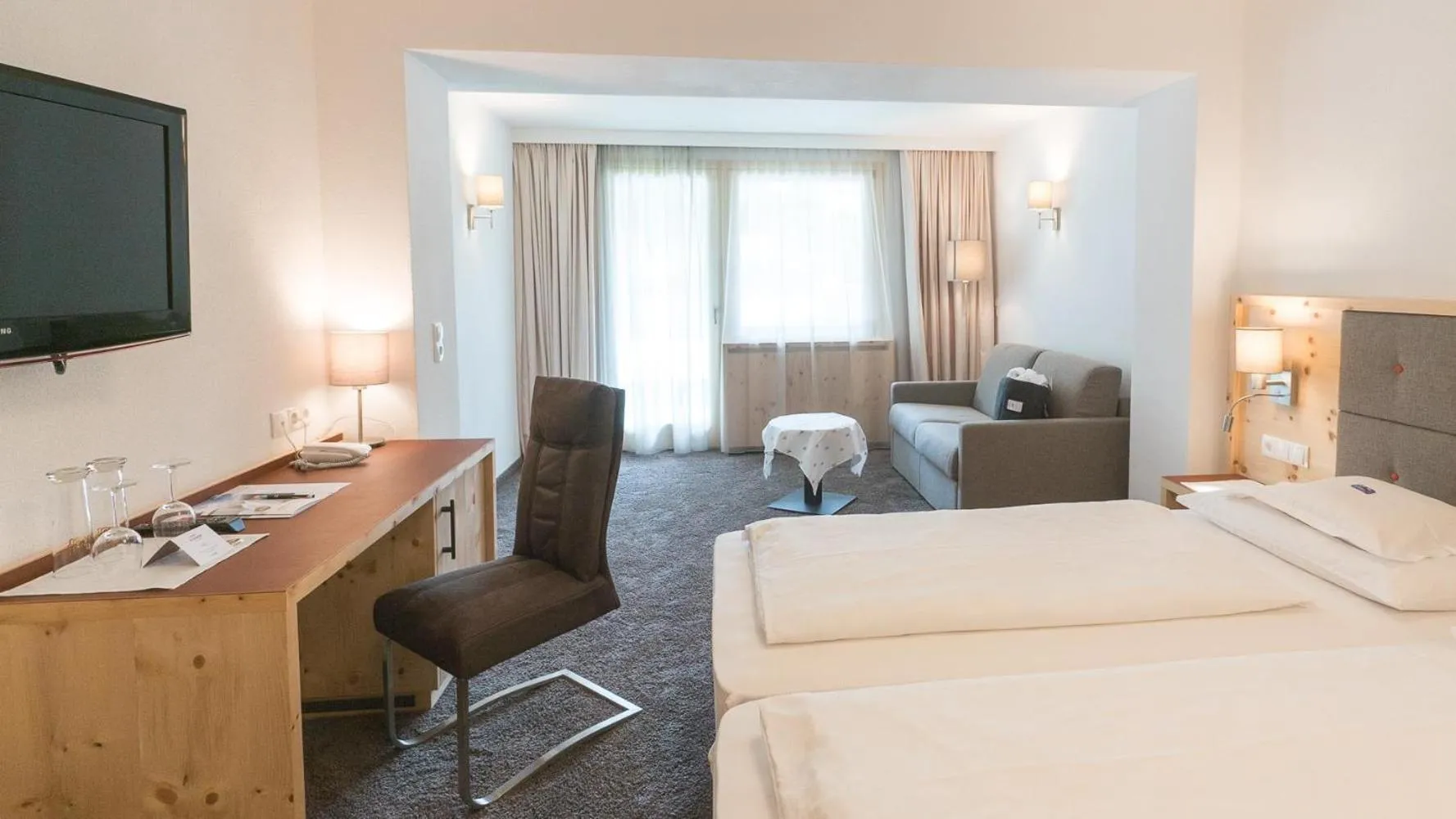 Photo of the whole room, Bed in Wellnesshotel Mein Almhof Superior