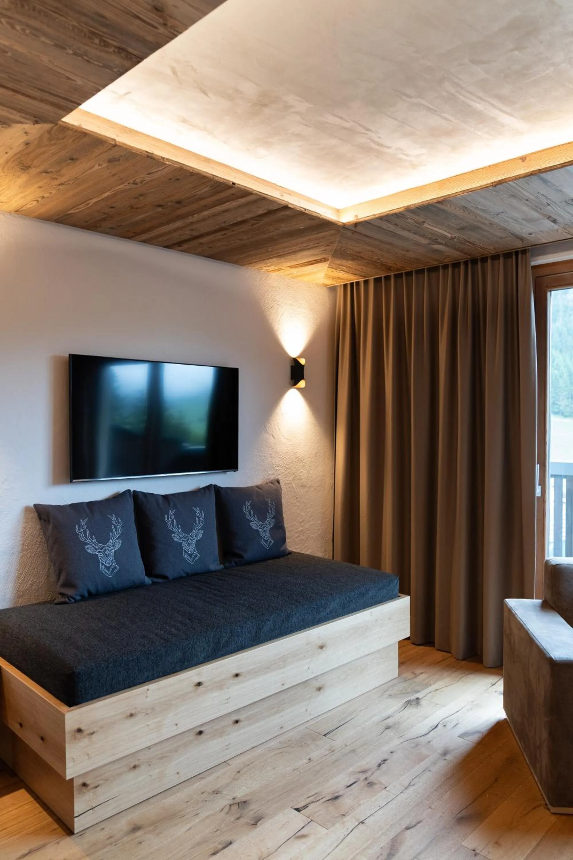 Communal lounge/ TV room, Bed in Wellnesshotel Mein Almhof Superior