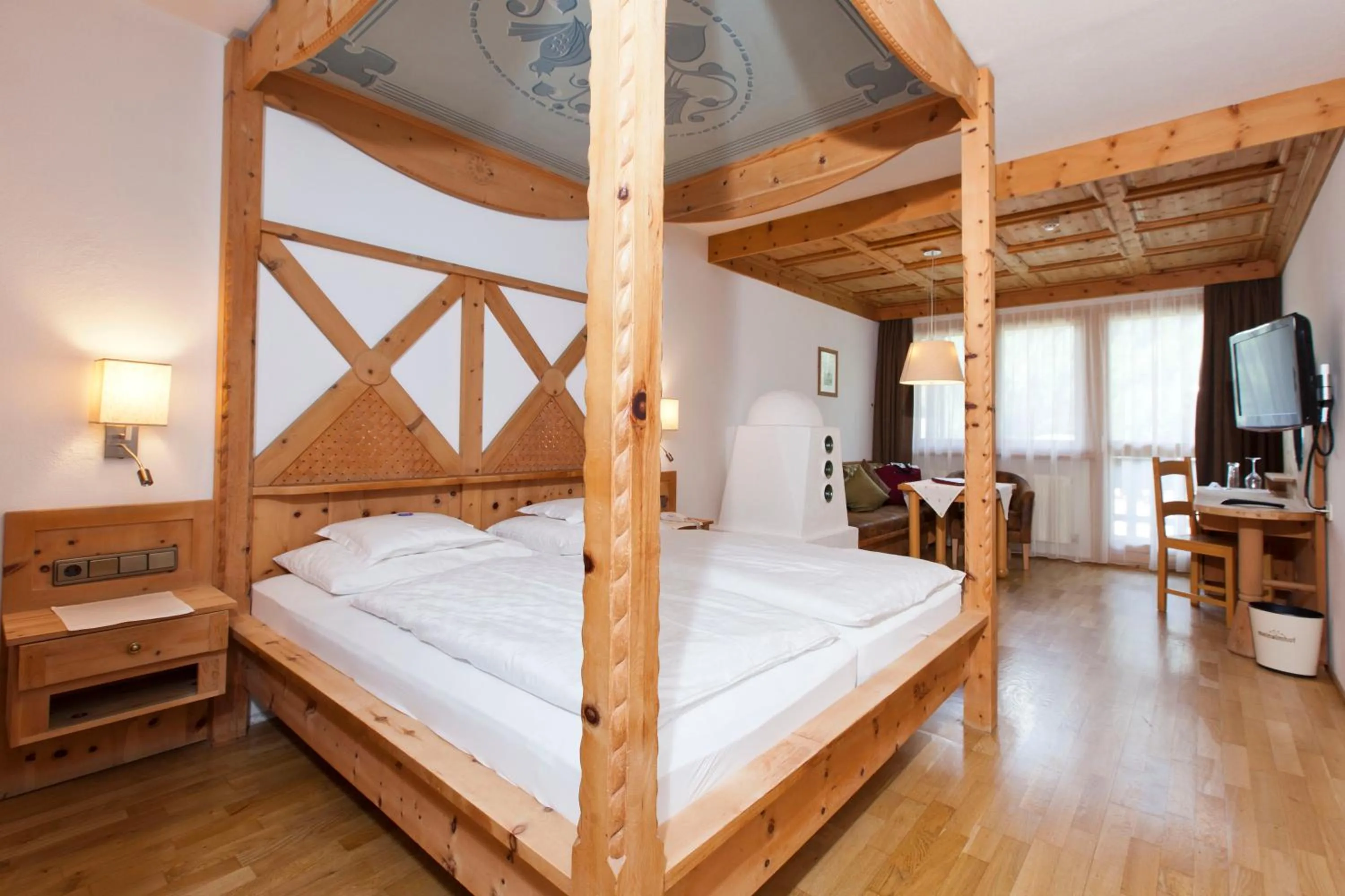 Photo of the whole room, Bed in Wellnesshotel Mein Almhof Superior