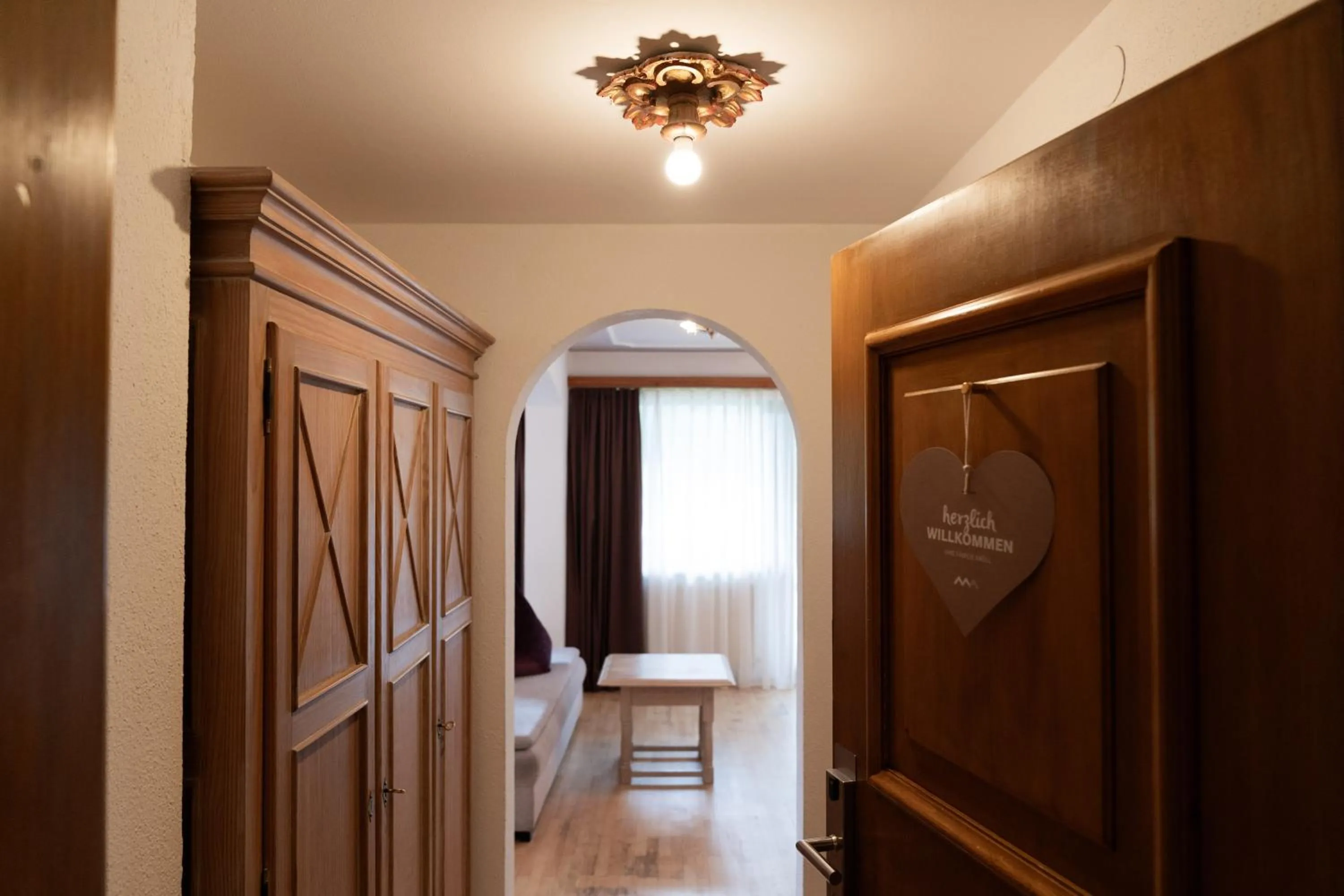 wardrobe, Bed in Wellnesshotel Mein Almhof Superior