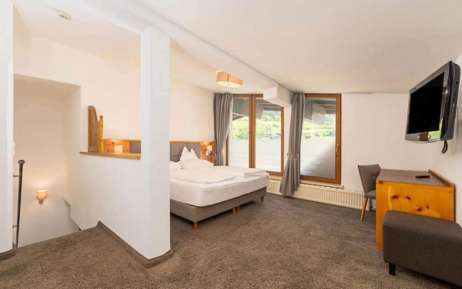 Bedroom, Bed in Wellnesshotel Mein Almhof Superior