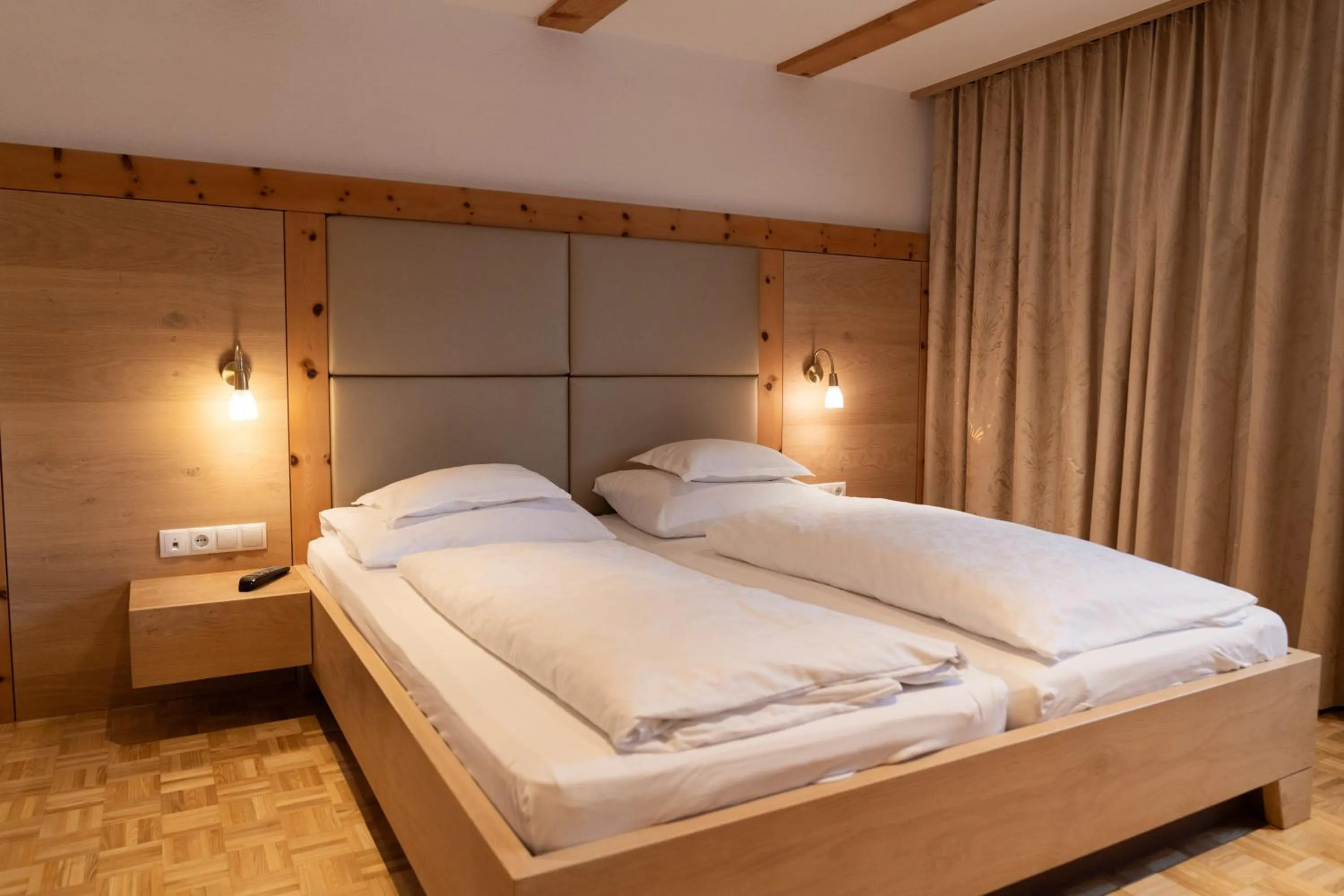 Bedroom, Bed in Wellnesshotel Mein Almhof Superior