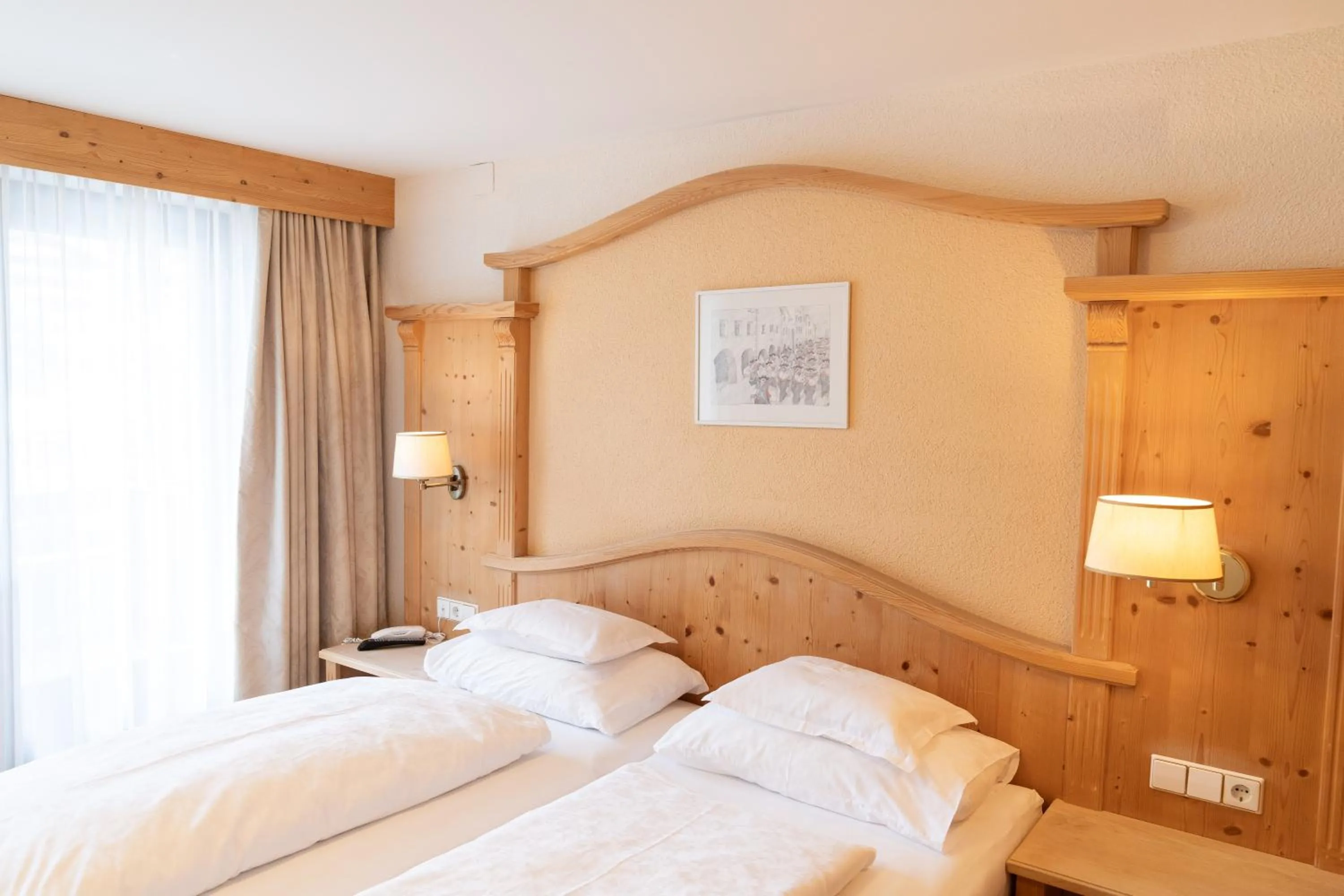 Bed in Wellnesshotel Mein Almhof Superior