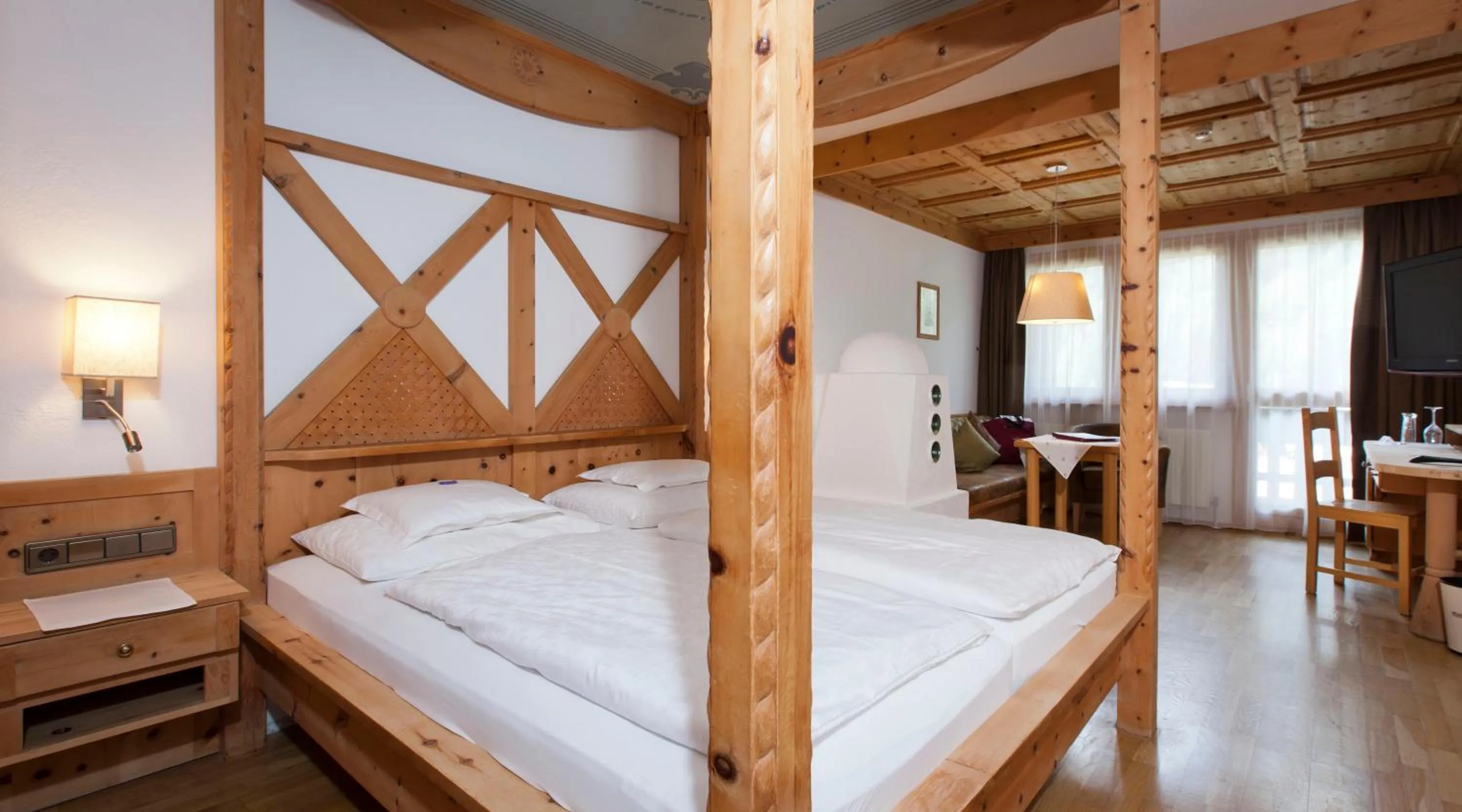 Photo of the whole room, Bed in Wellnesshotel Mein Almhof Superior