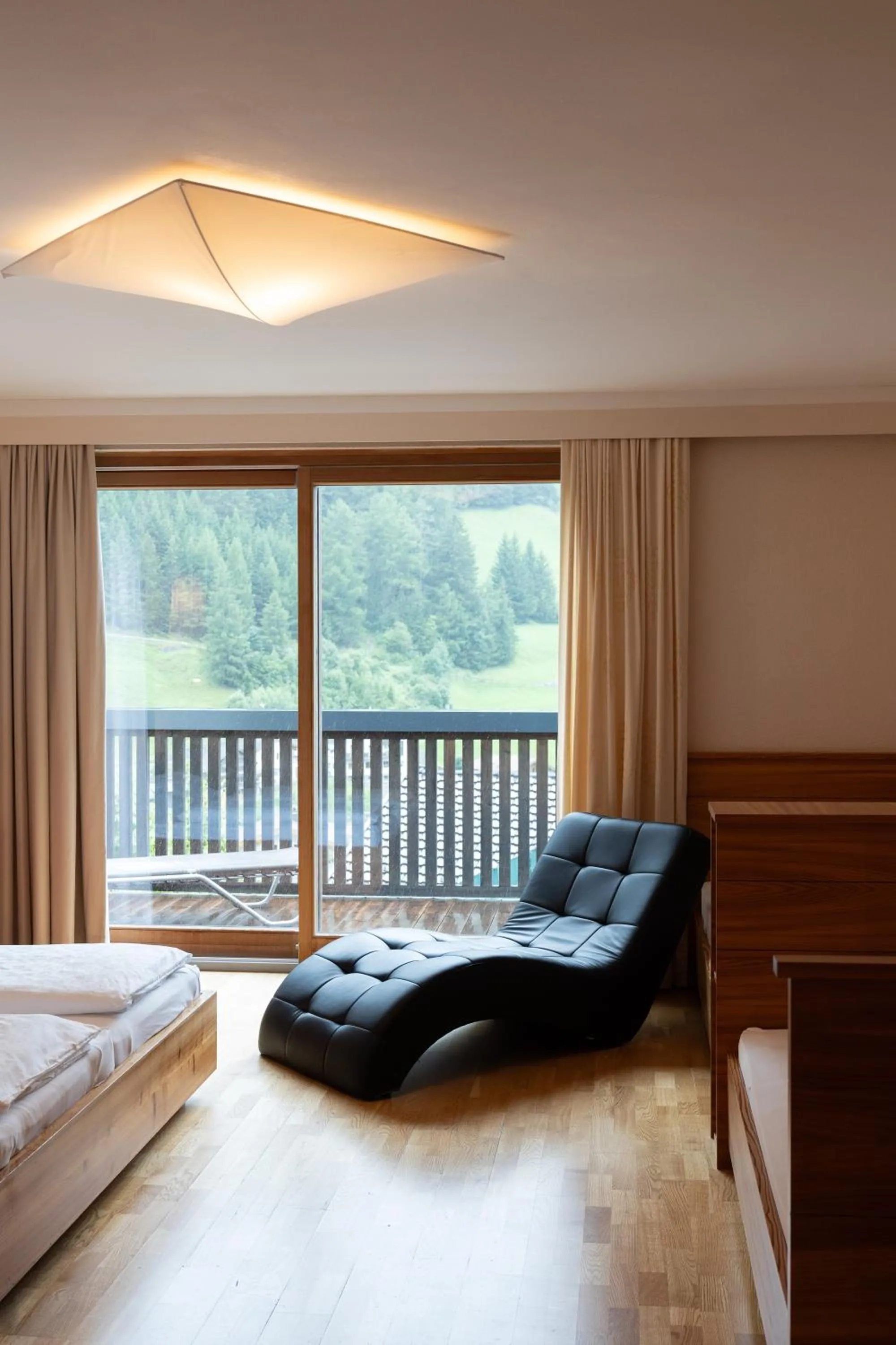 Living room, Bed in Wellnesshotel Mein Almhof Superior