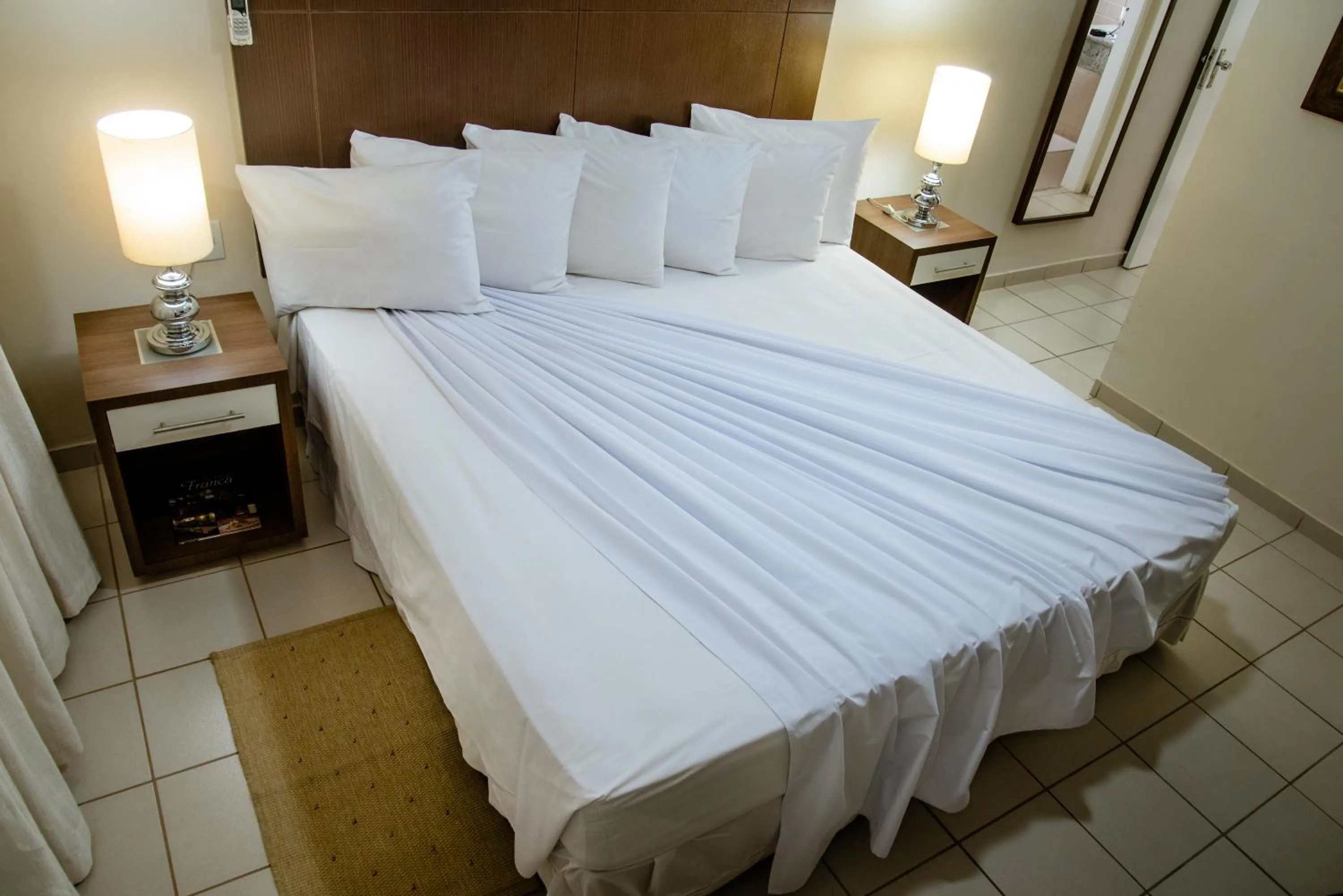 Bed in Imperador Palace Hotel Franca