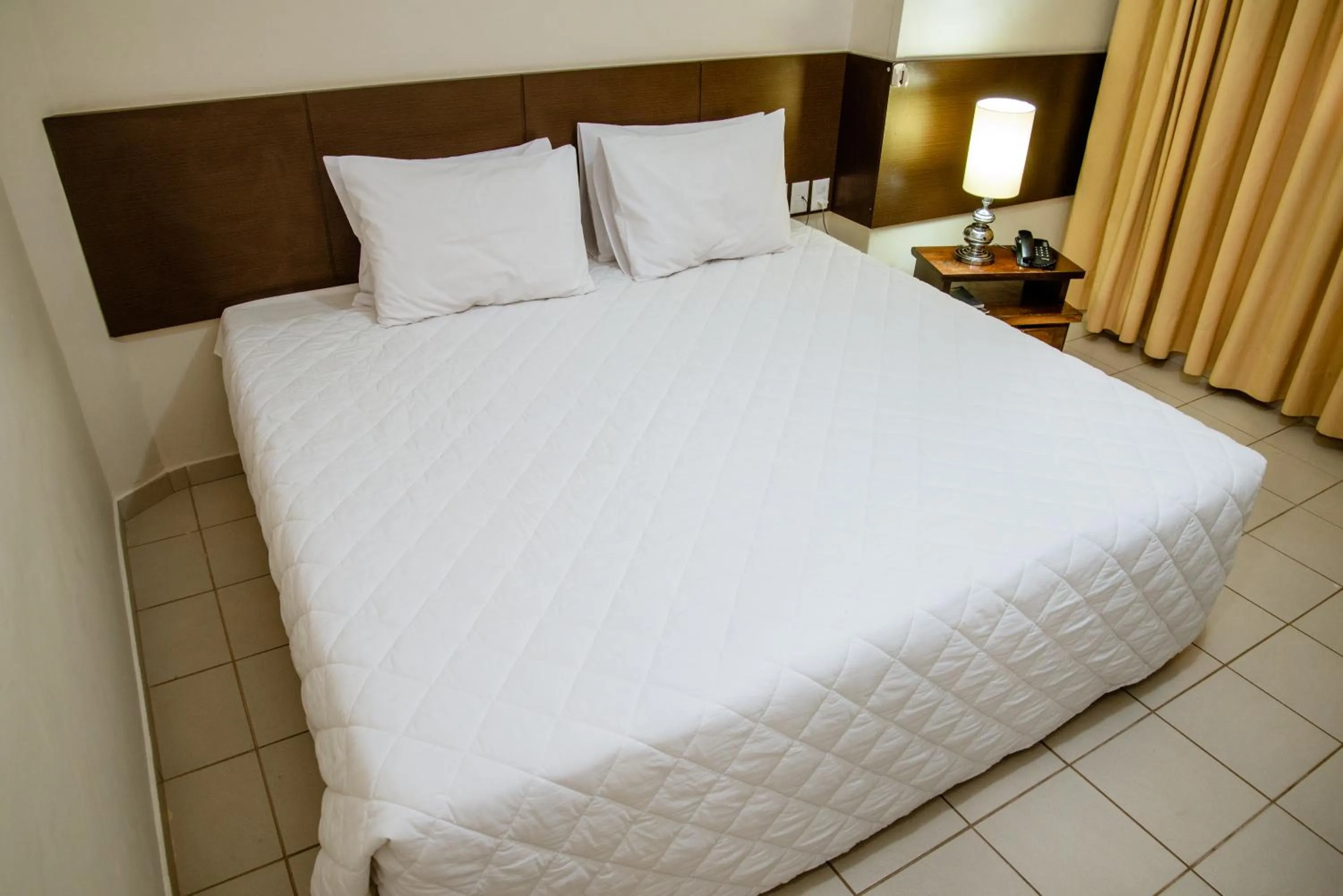 Bed in Imperador Palace Hotel Franca