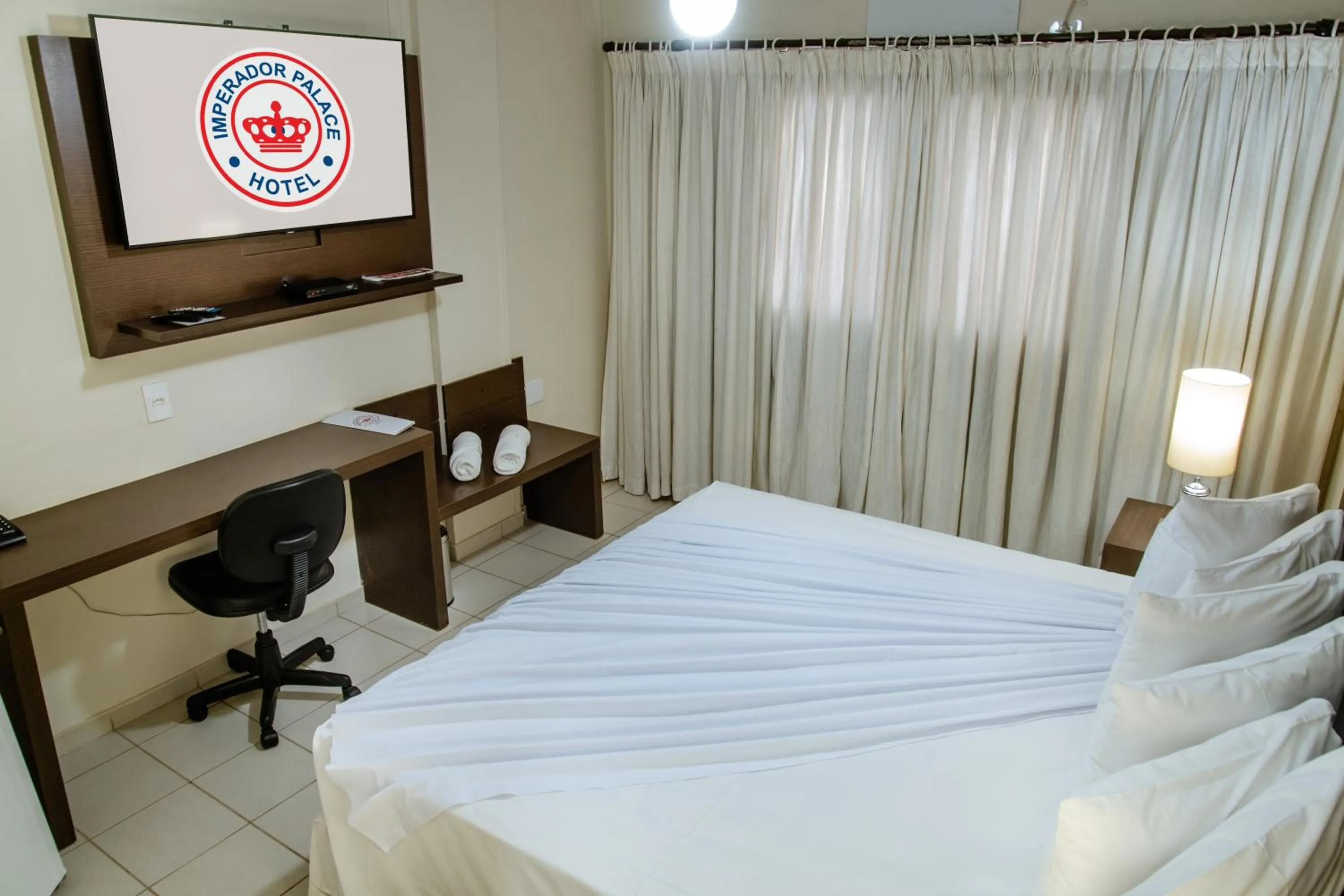 Bed in Imperador Palace Hotel Franca