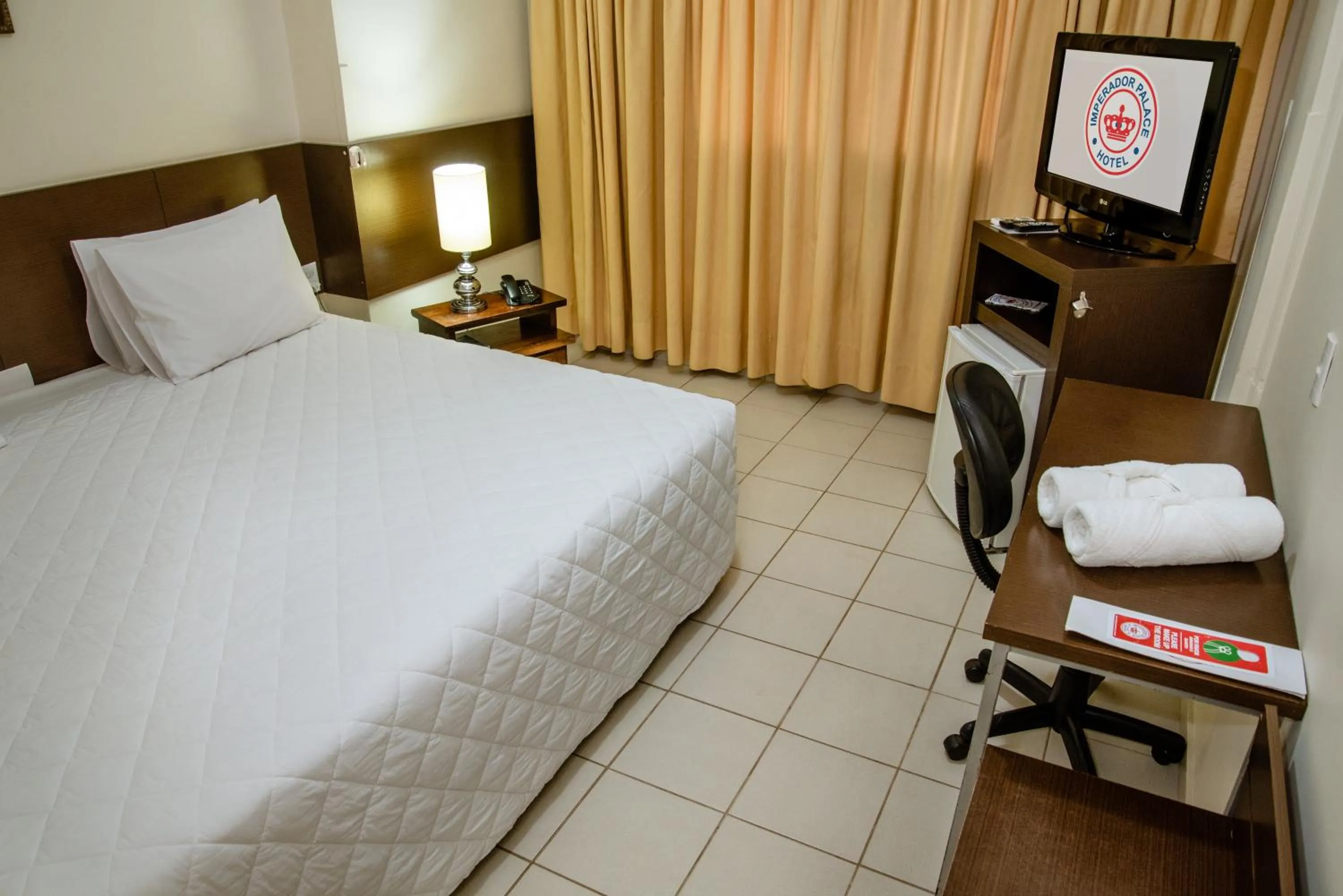 Bed in Imperador Palace Hotel Franca