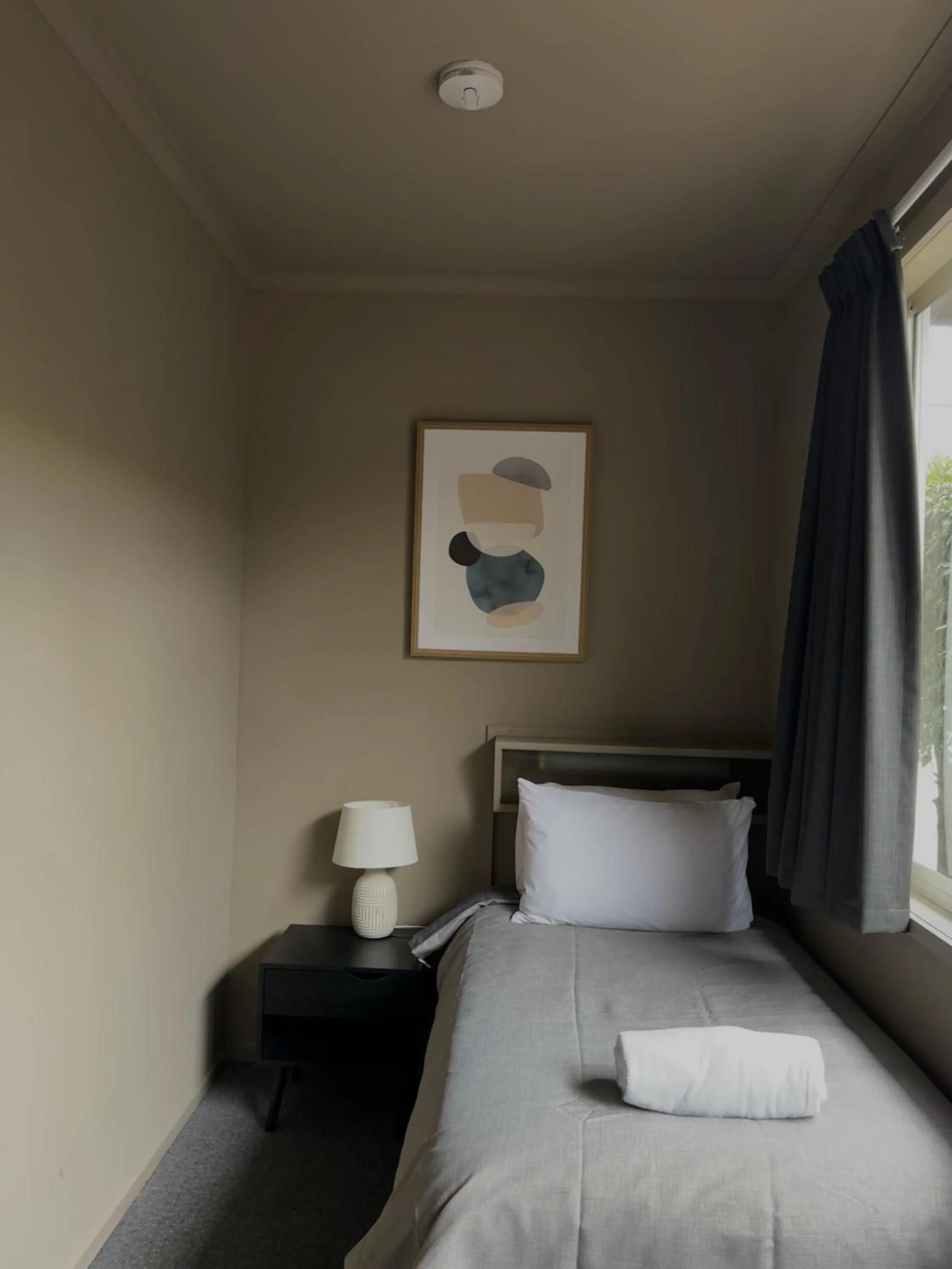 Bed in Calder Family Motel