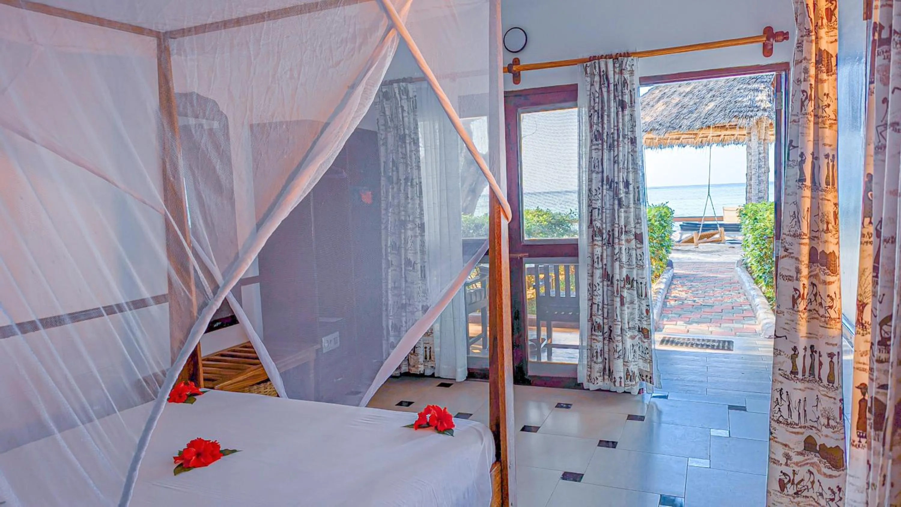Photo of the whole room, Bed in Mnarani Beach Cottages