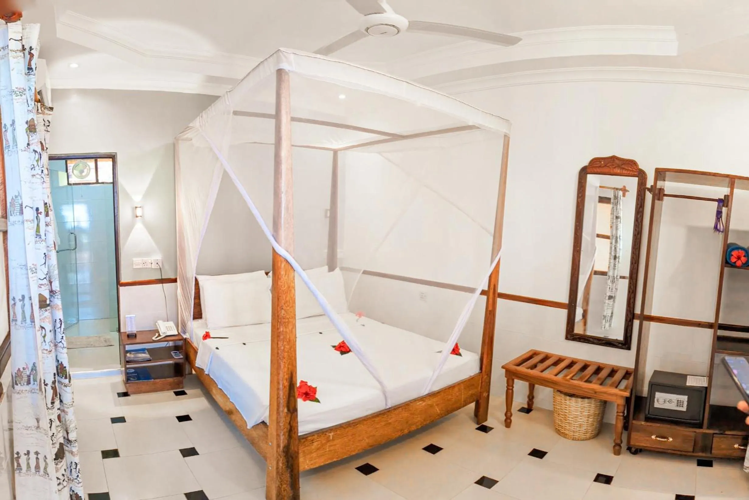 Bed in Mnarani Beach Cottages