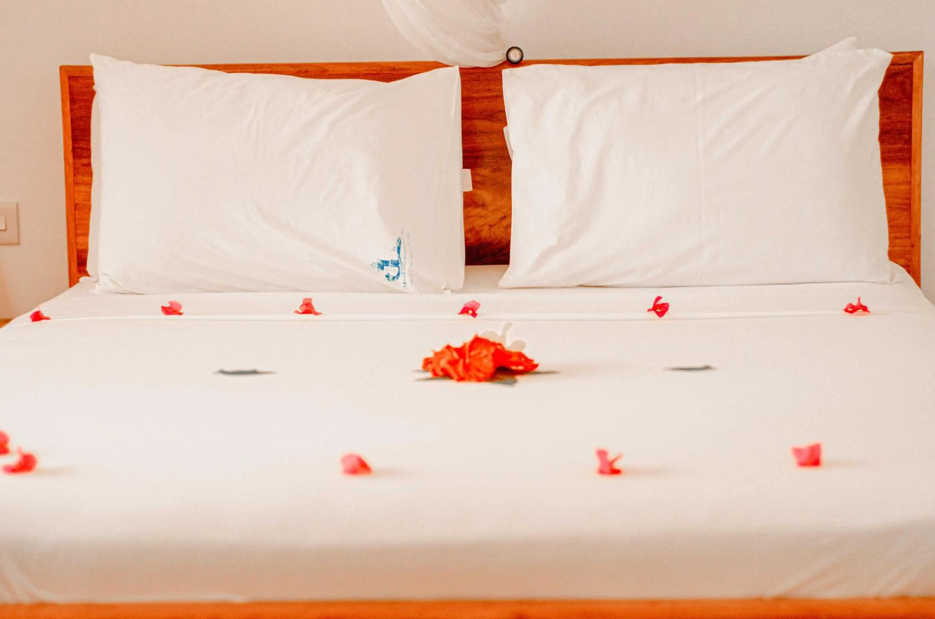 Bed in Mnarani Beach Cottages