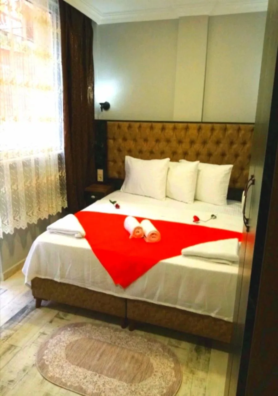 Bed in Yasin Apart hotel