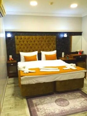 Bed in Yasin Apart hotel