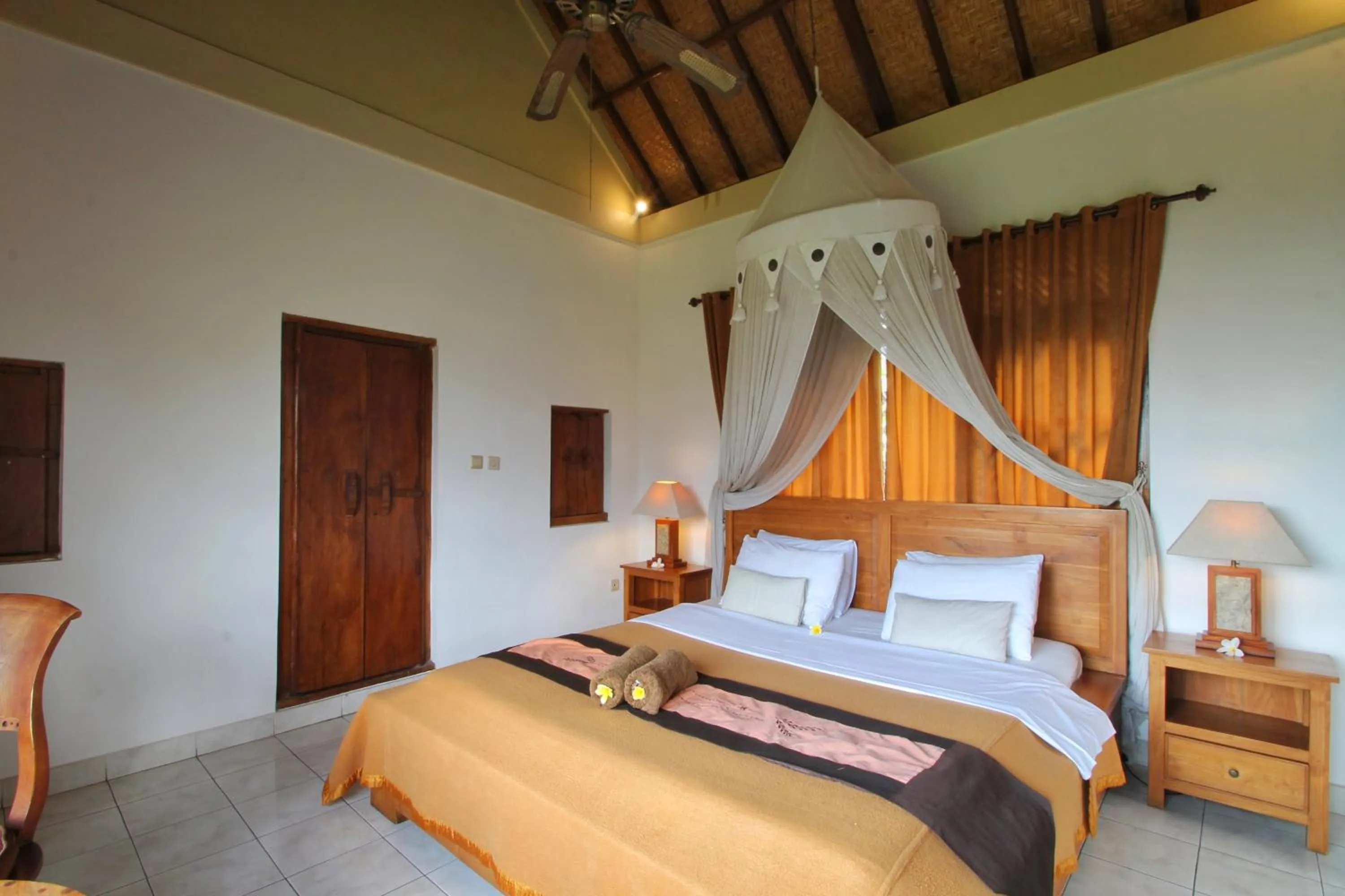 Bed in Hibiscus Cottages