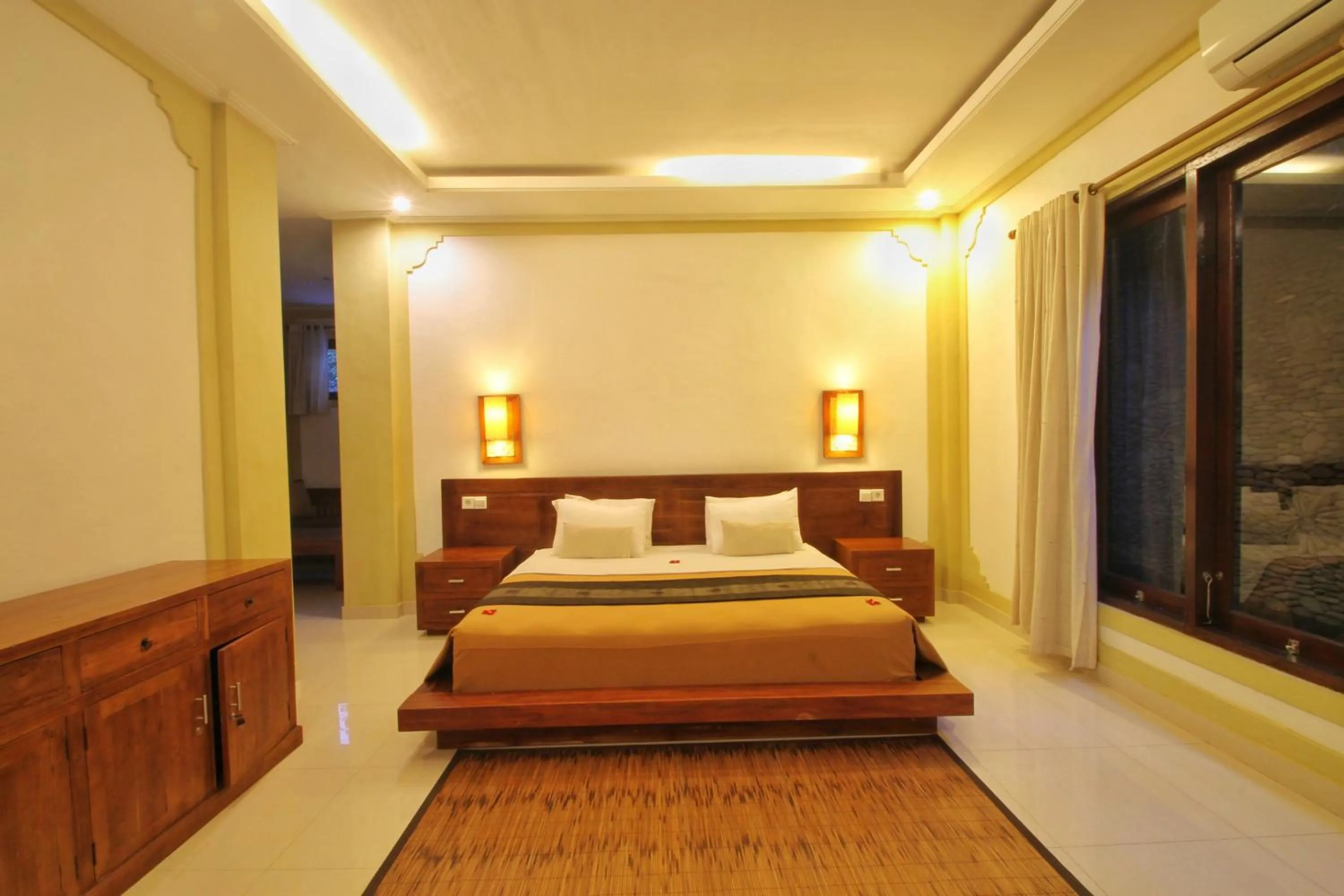 Bed in Hibiscus Cottages