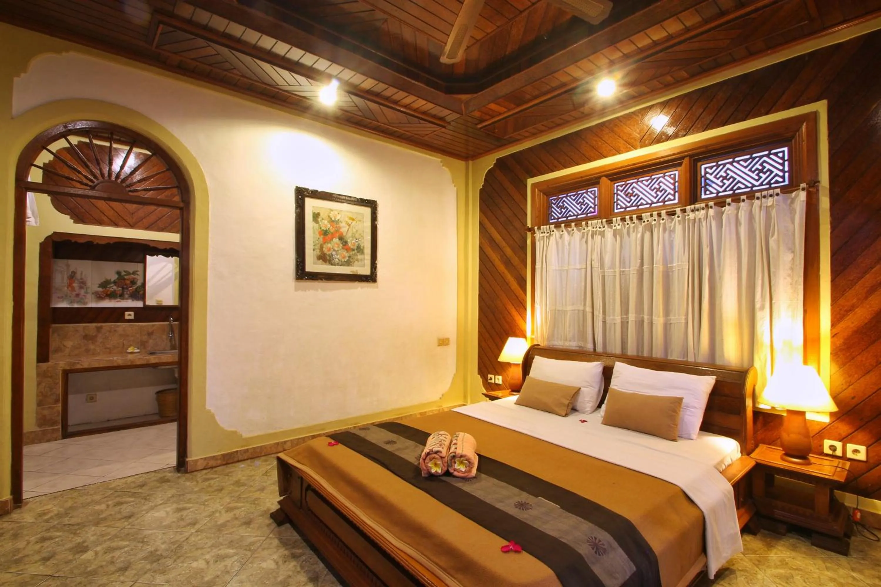 Bed in Hibiscus Cottages