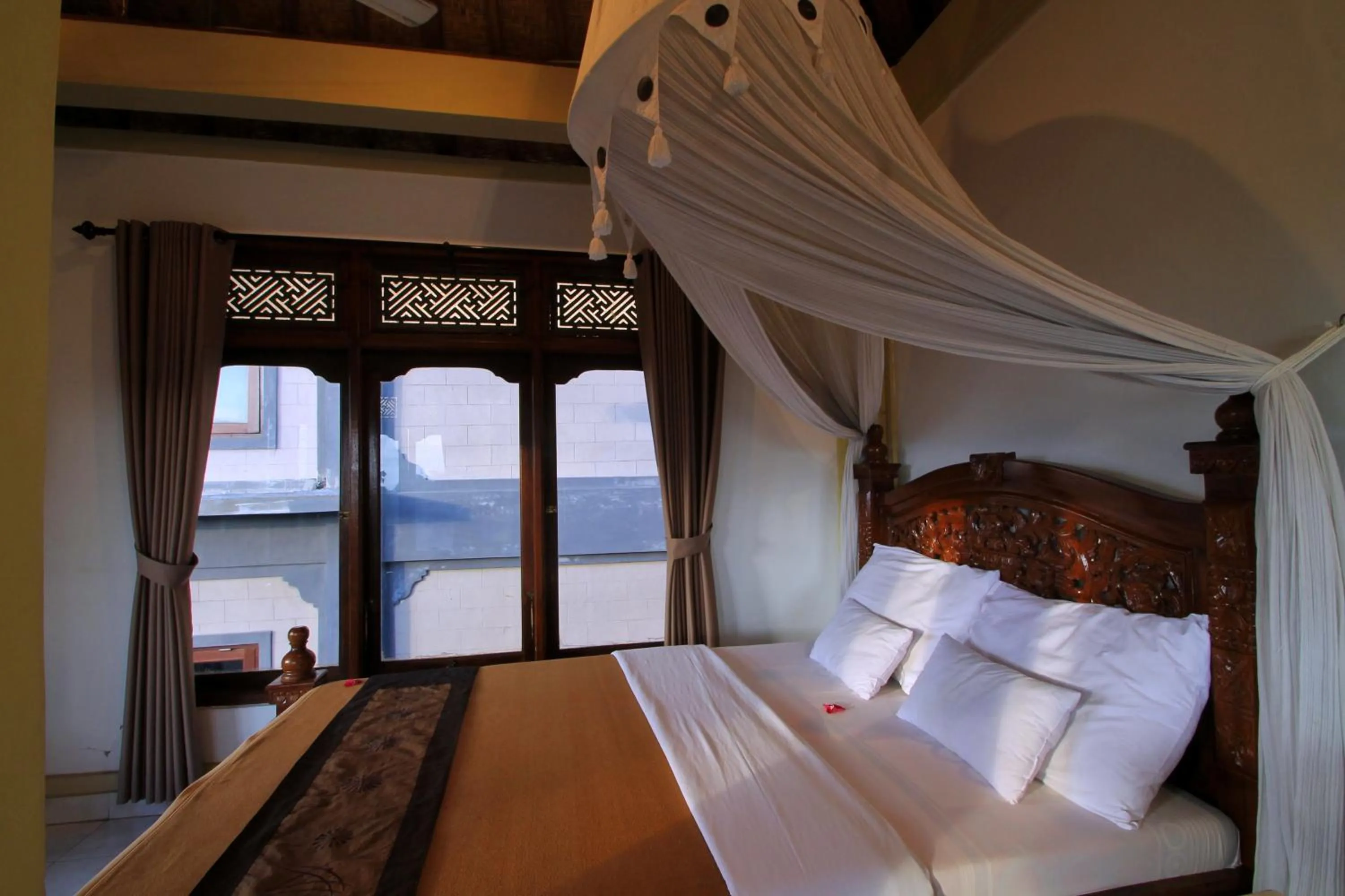 Bed in Hibiscus Cottages
