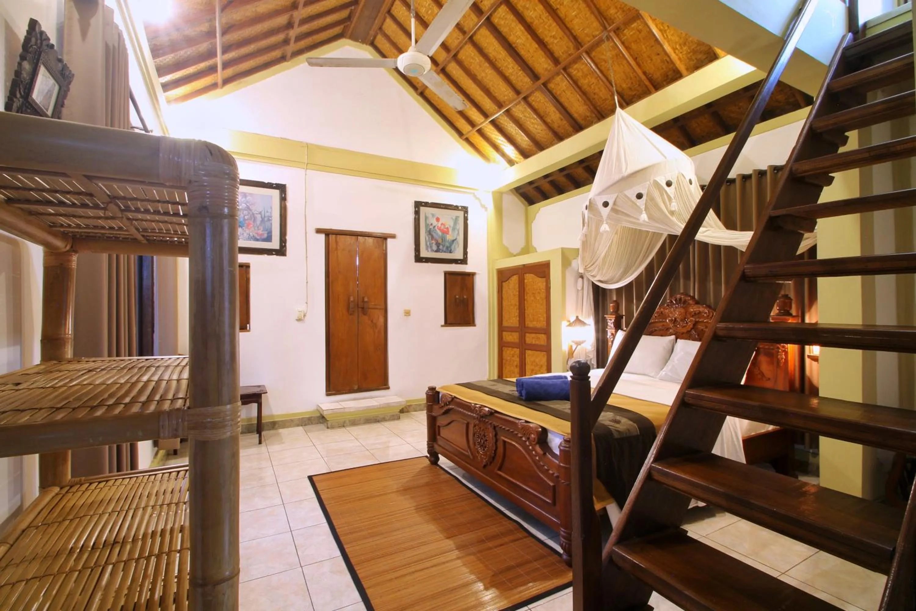 Bed in Hibiscus Cottages