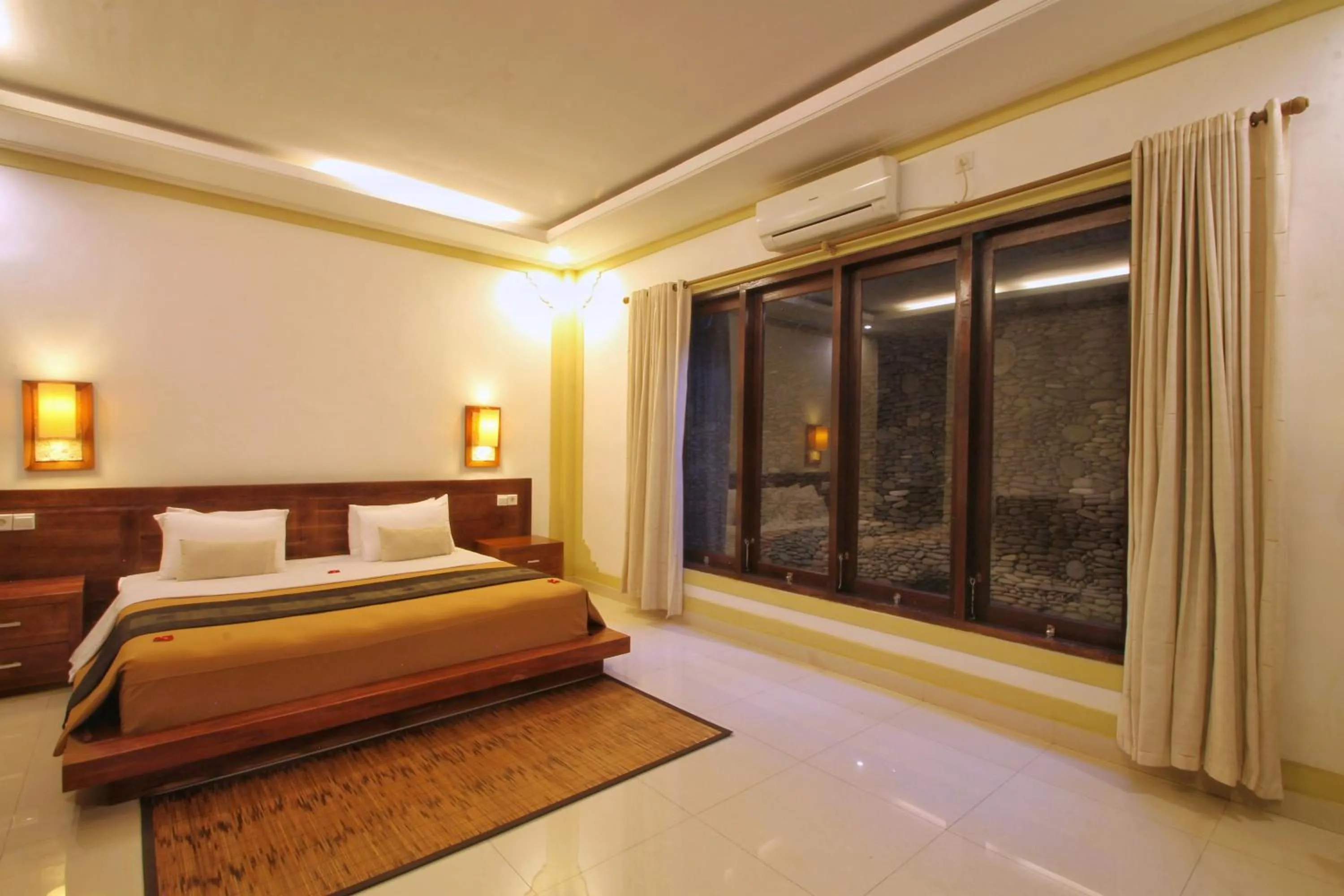 Bed in Hibiscus Cottages