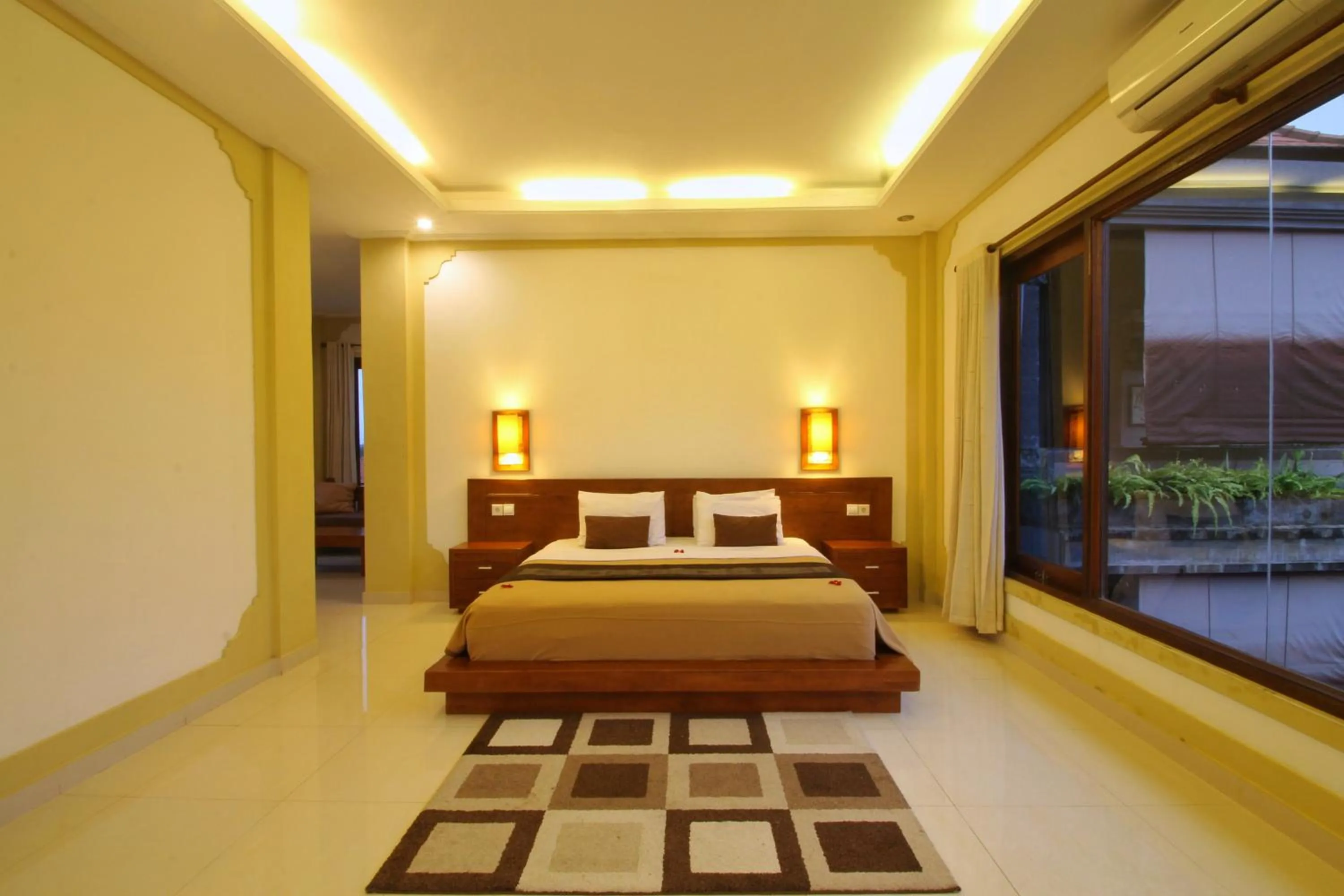 Bed in Hibiscus Cottages