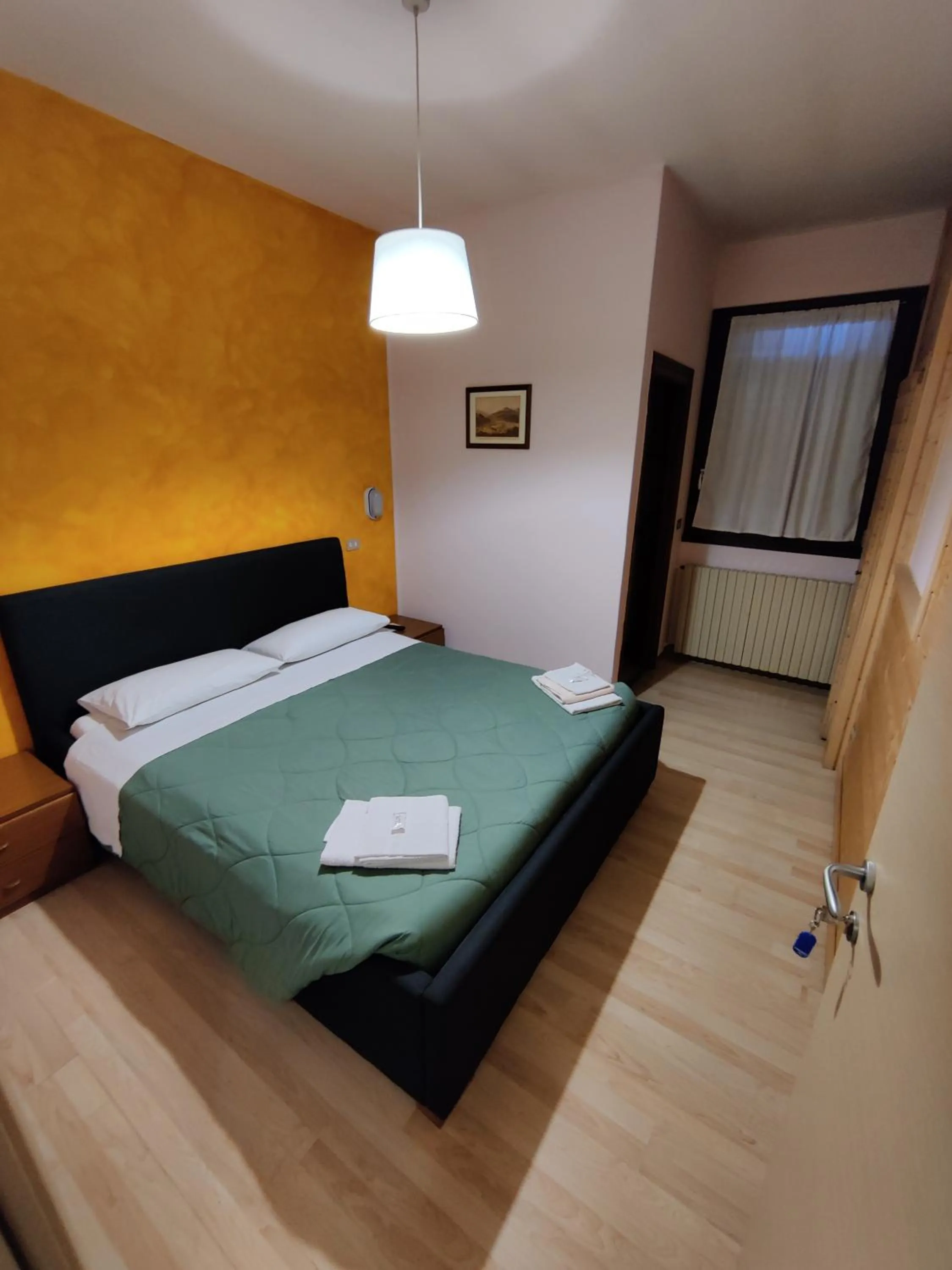 Bed in Albergo Baffo