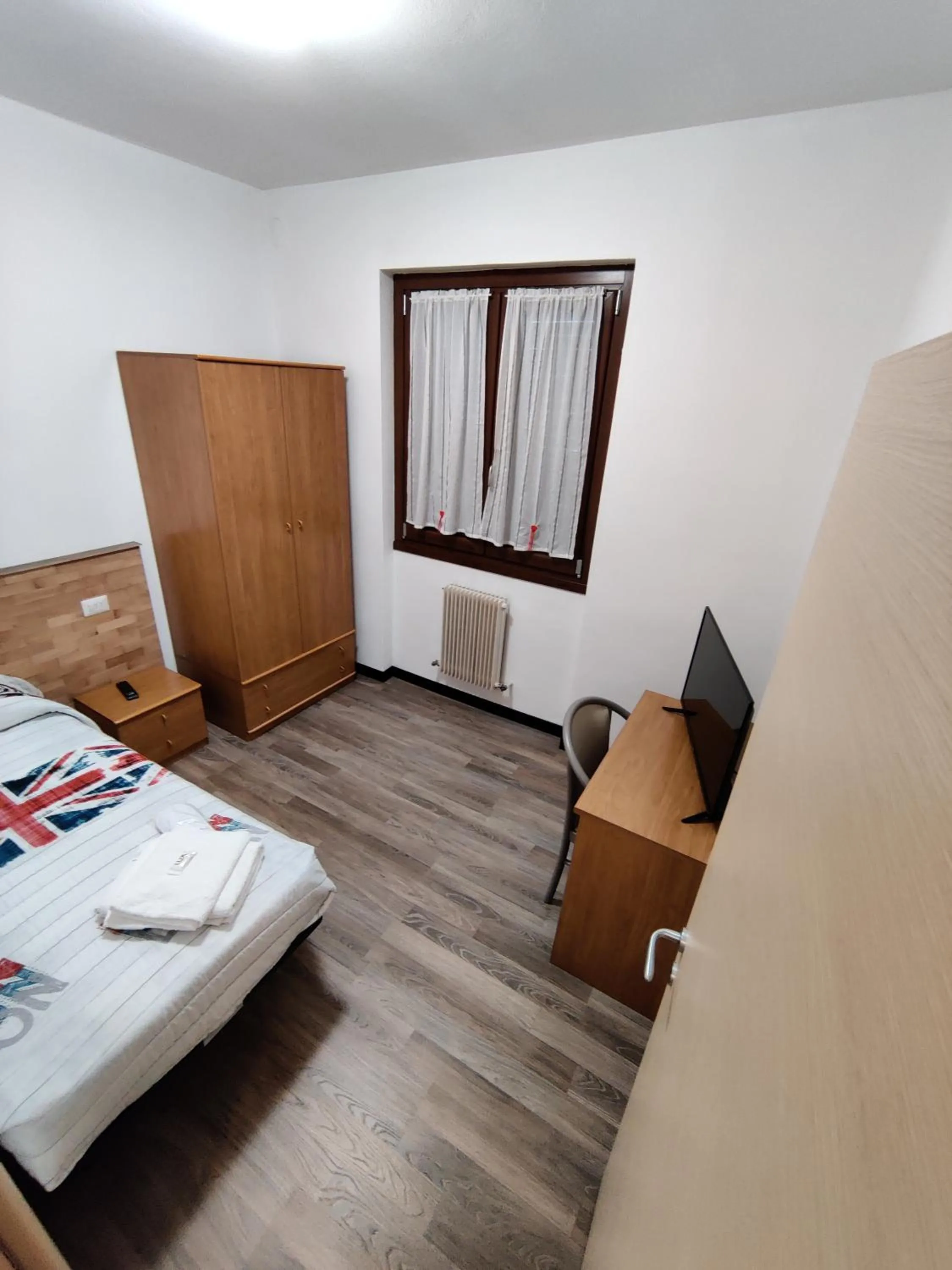 Bed in Albergo Baffo
