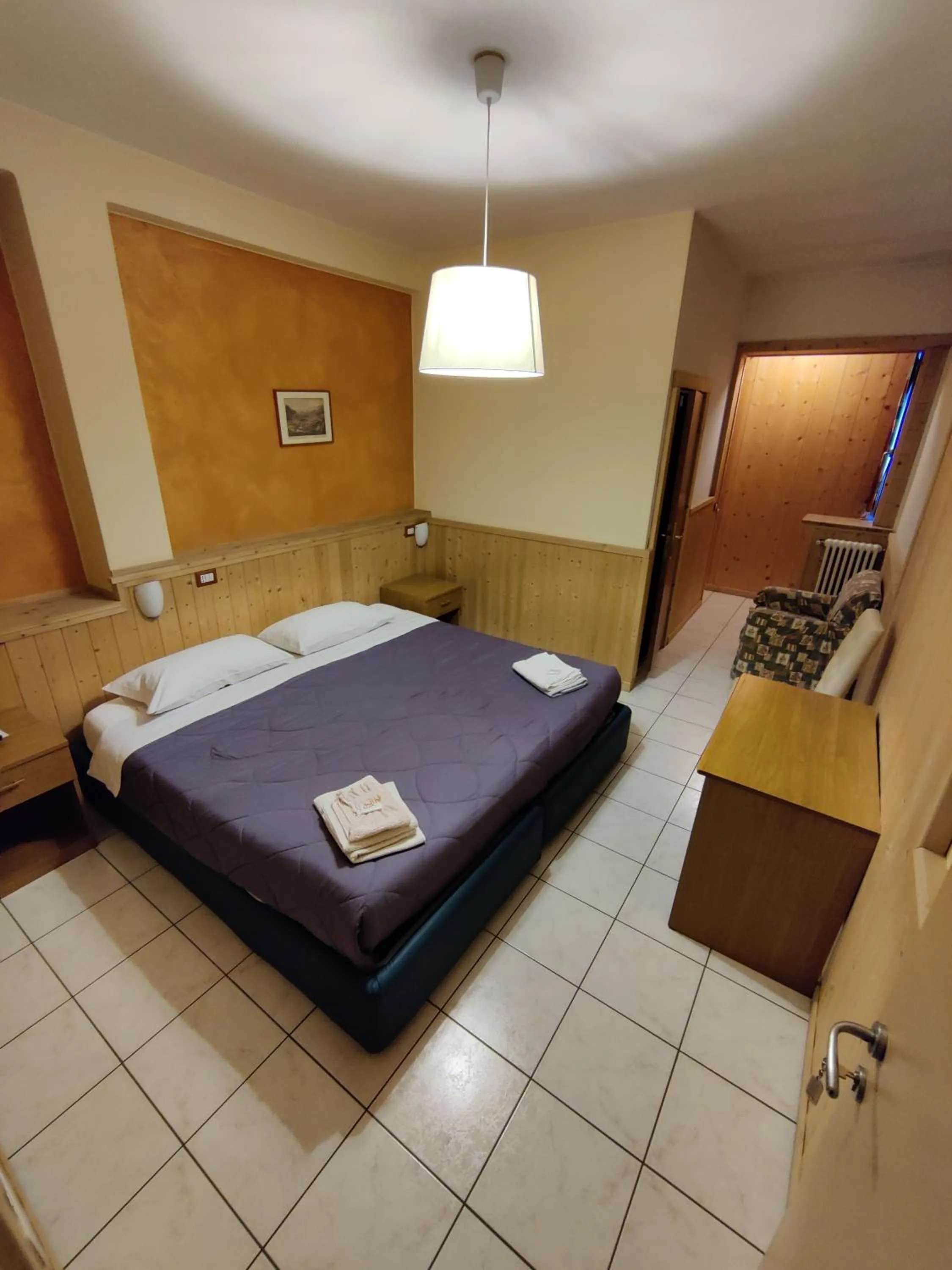 Bed in Albergo Baffo